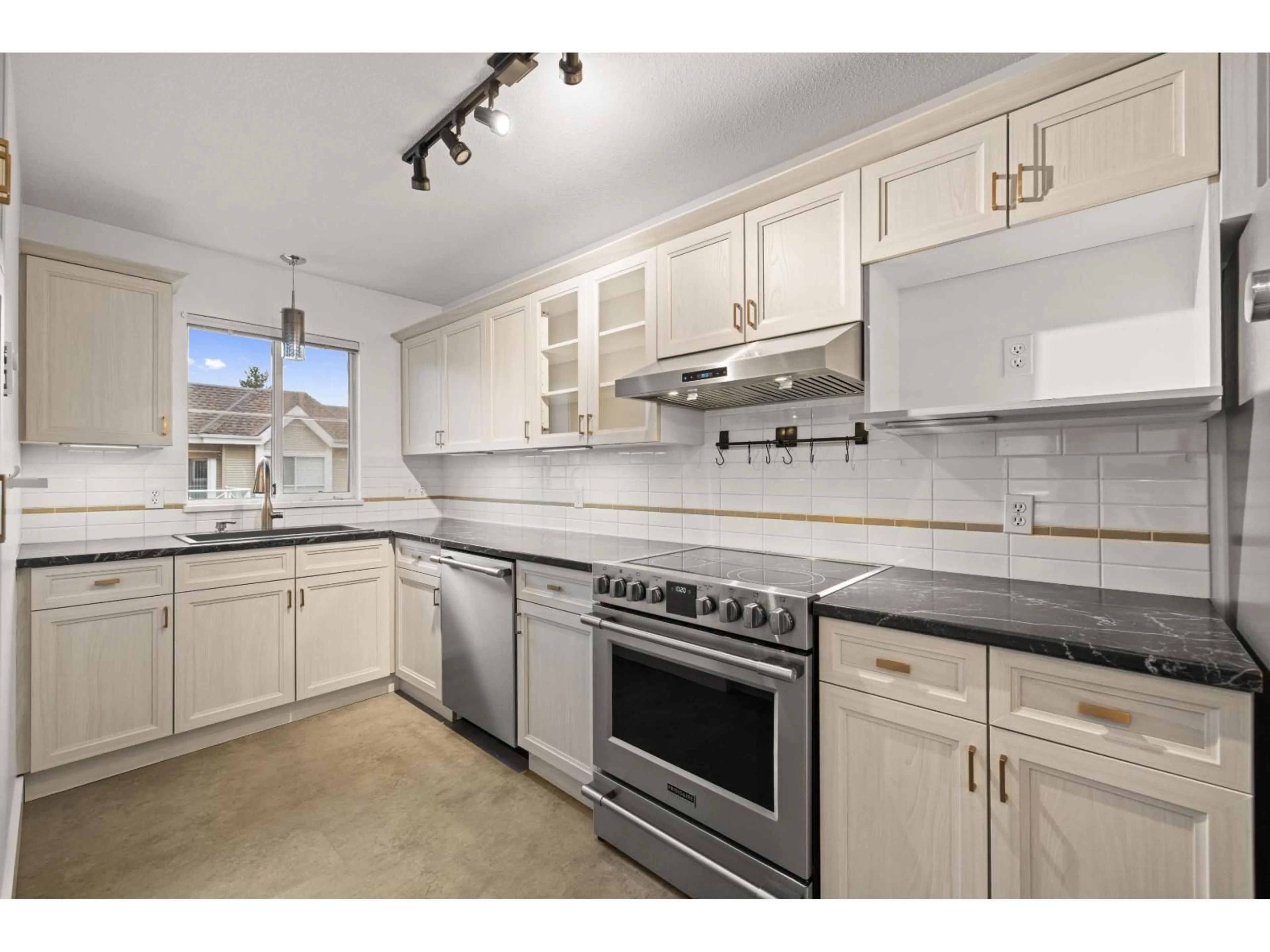 Standard kitchen, ceramic/tile floor for 302 - 5556 201A STREET, Langley British Columbia V3A8K5