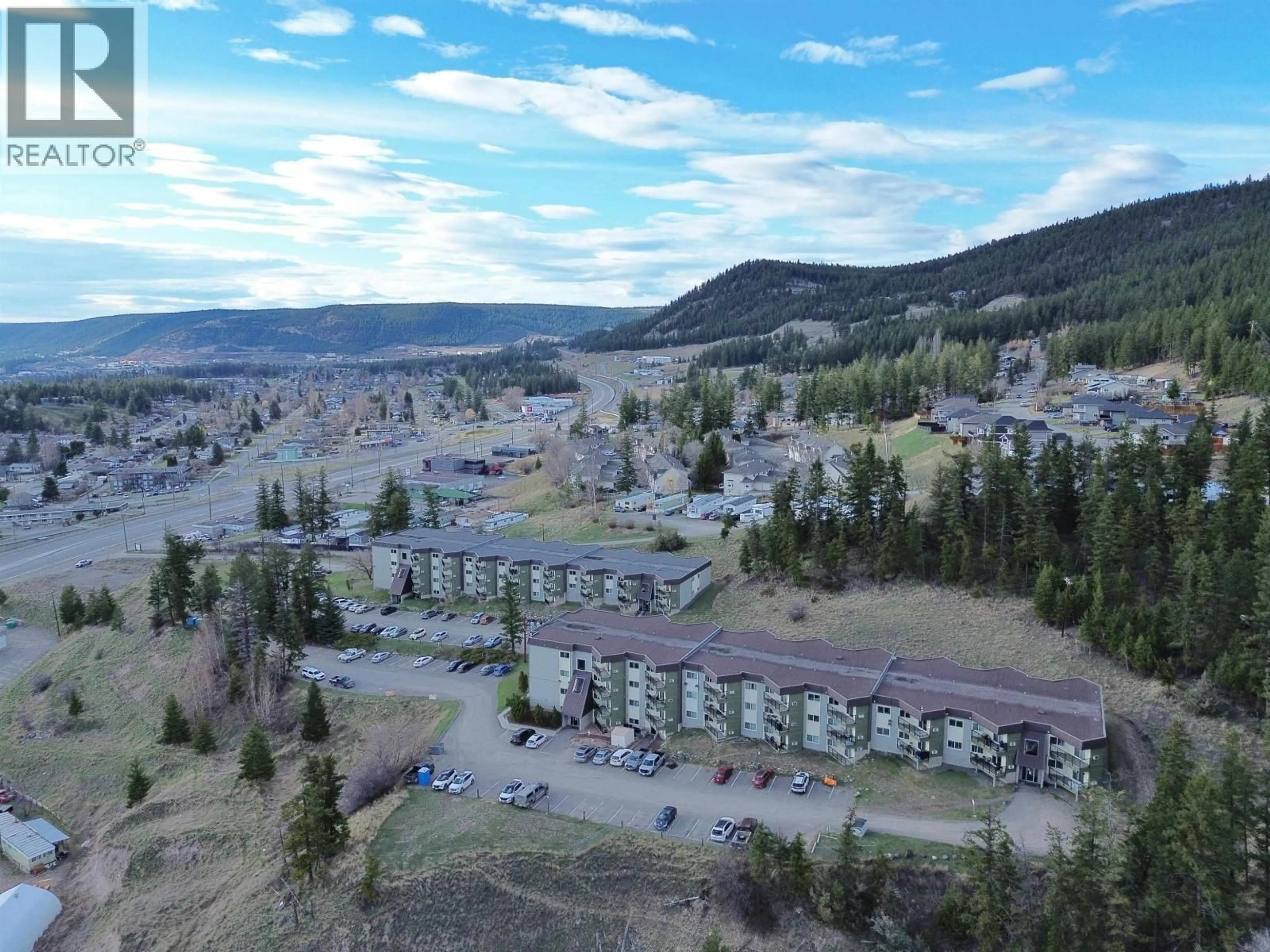 A pic from outside/outdoor area/front of a property/back of a property/a pic from drone, mountain view for 415 - 282 BROADWAY AVENUE, Williams Lake British Columbia V2G4J8