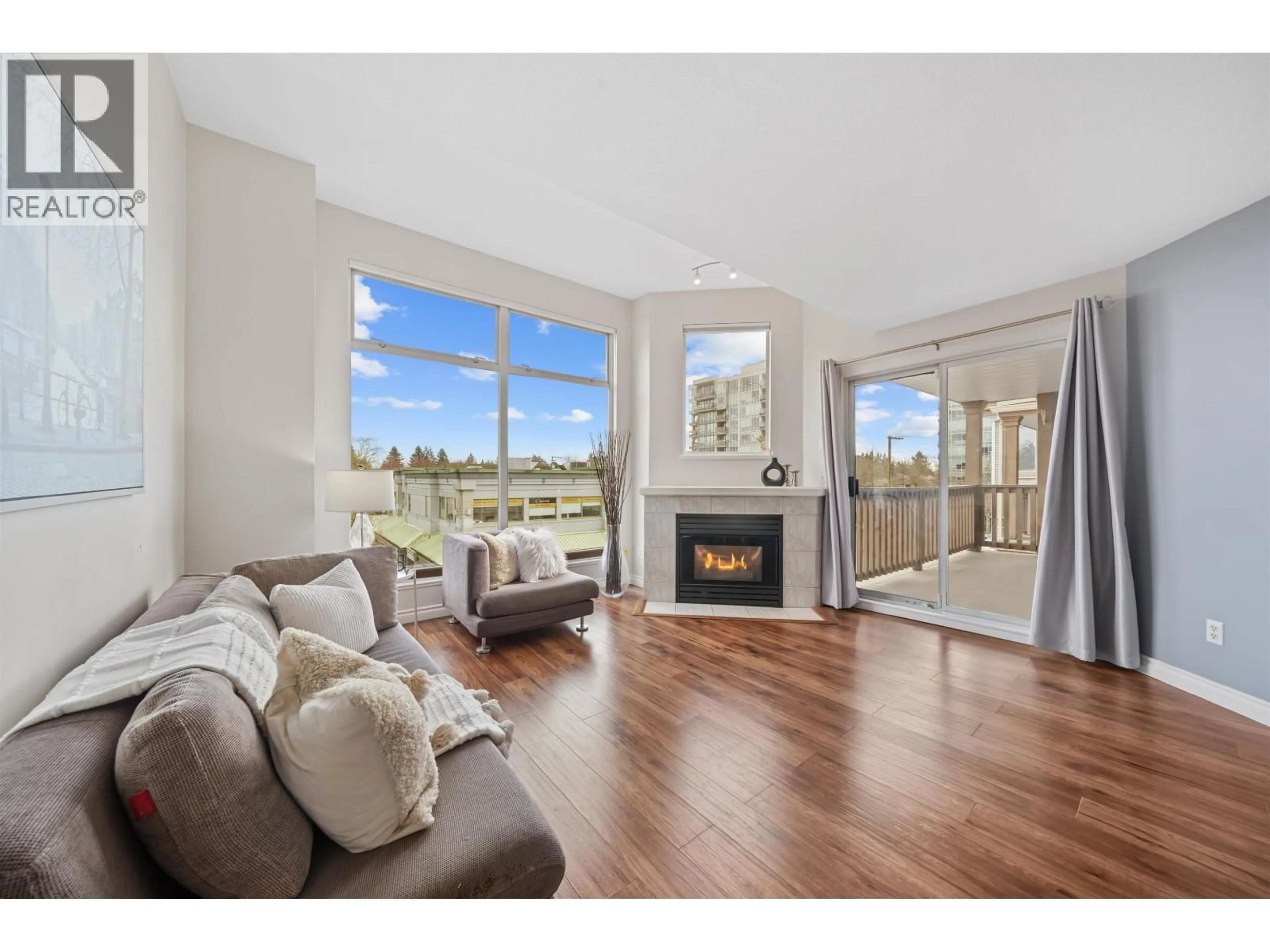 Living room with furniture, wood/laminate floor for 307 - 19131 FORD ROAD, Pitt Meadows British Columbia V3Y2R5
