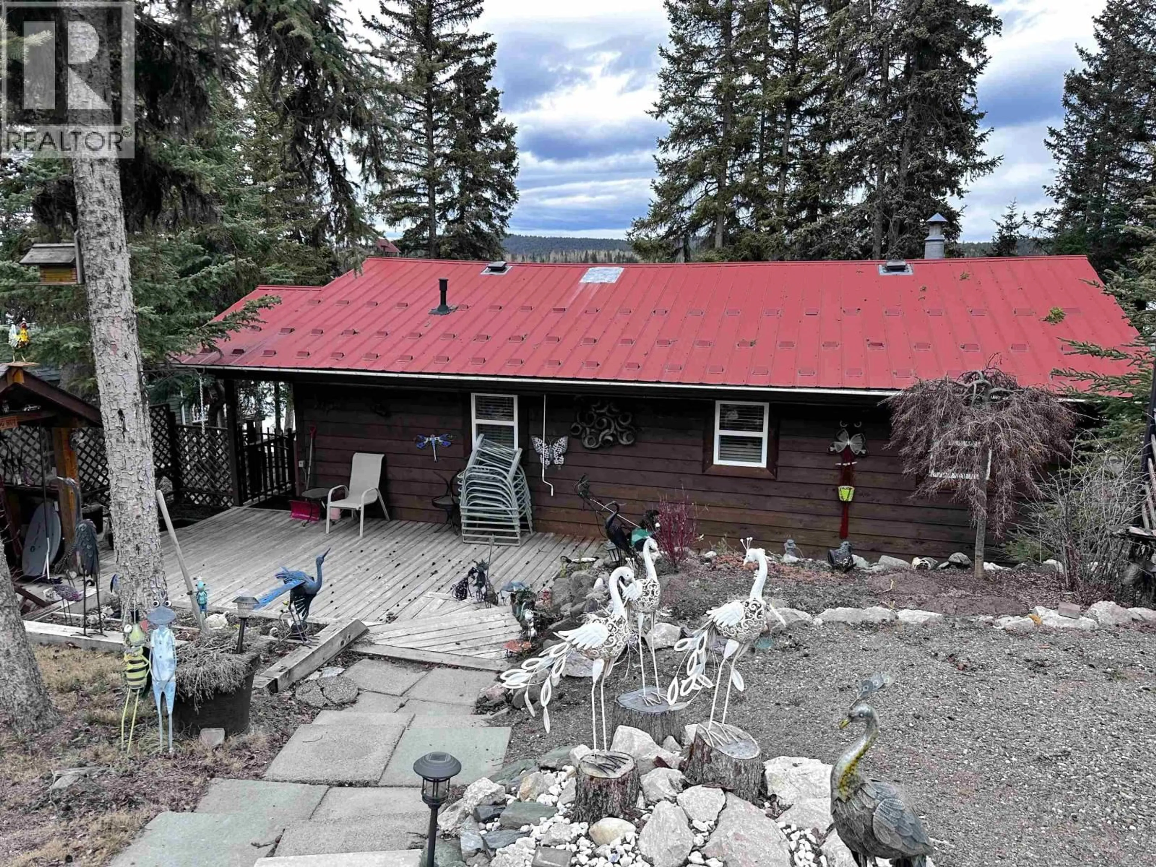 A pic from outside/outdoor area/front of a property/back of a property/a pic from drone, mountain view for 6361 MOOSE POINT DRIVE, 100 Mile House British Columbia V0K2K1