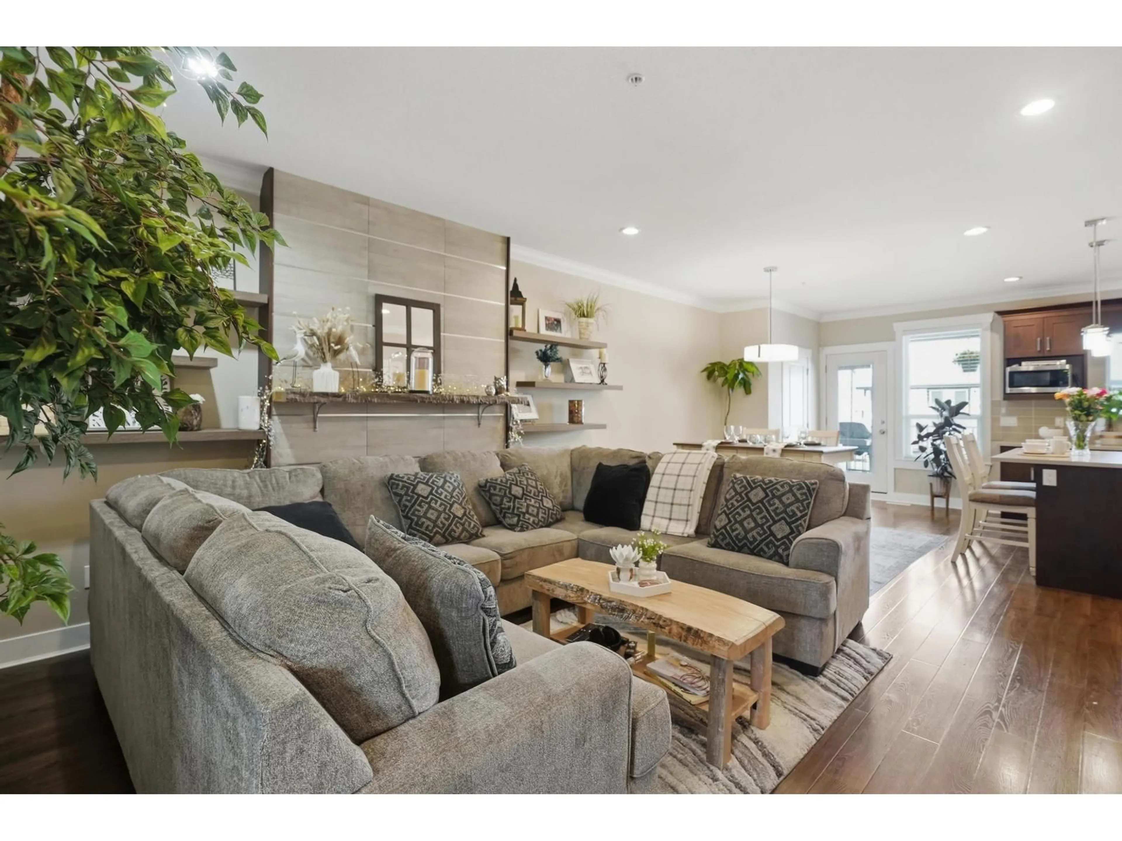 Living room with furniture, wood/laminate floor for 20919 80 AVENUE, Langley British Columbia V2Y0R3