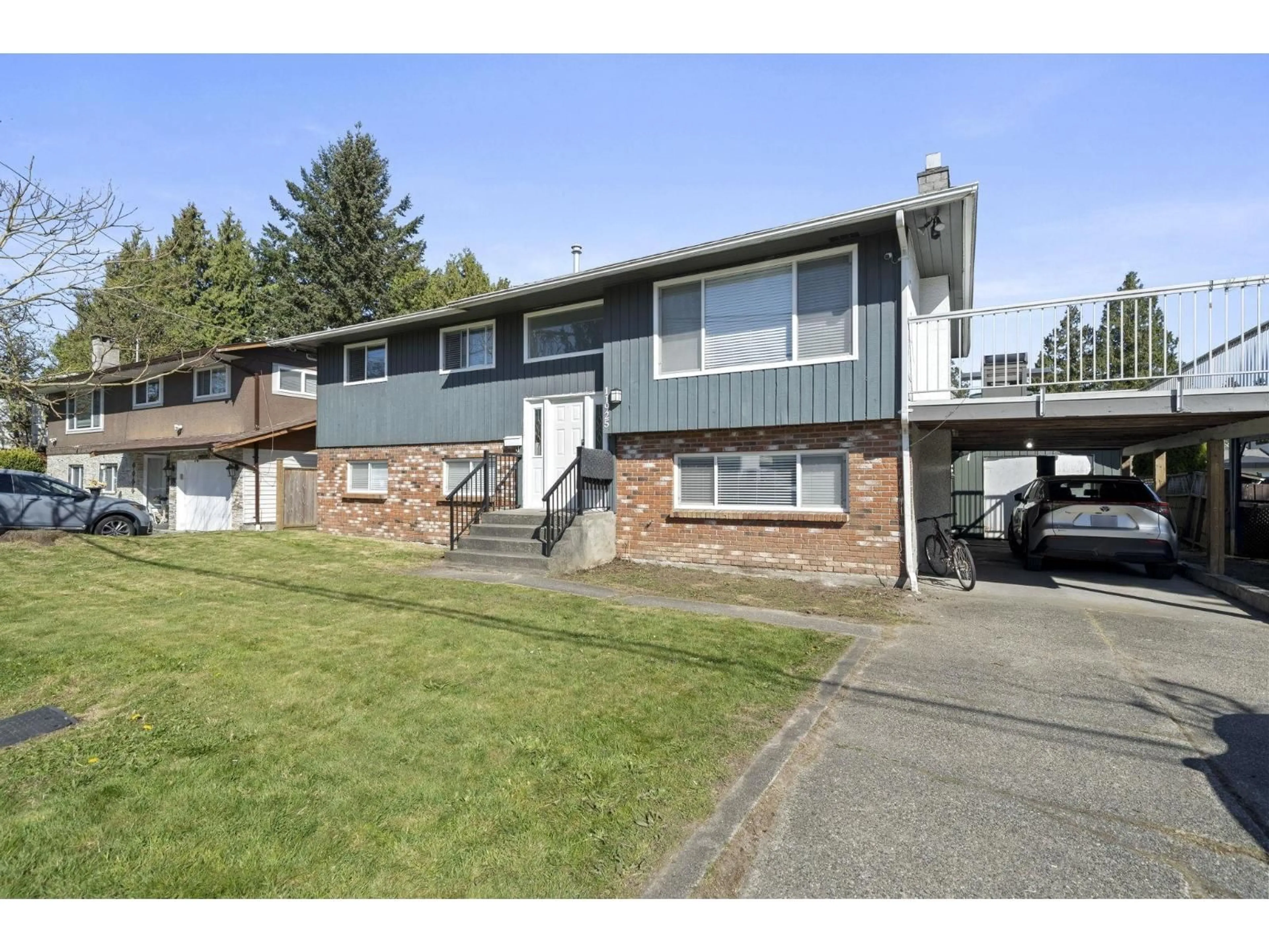 Home with vinyl exterior material, street for 11925 92A AVENUE, Delta British Columbia V4C3N3