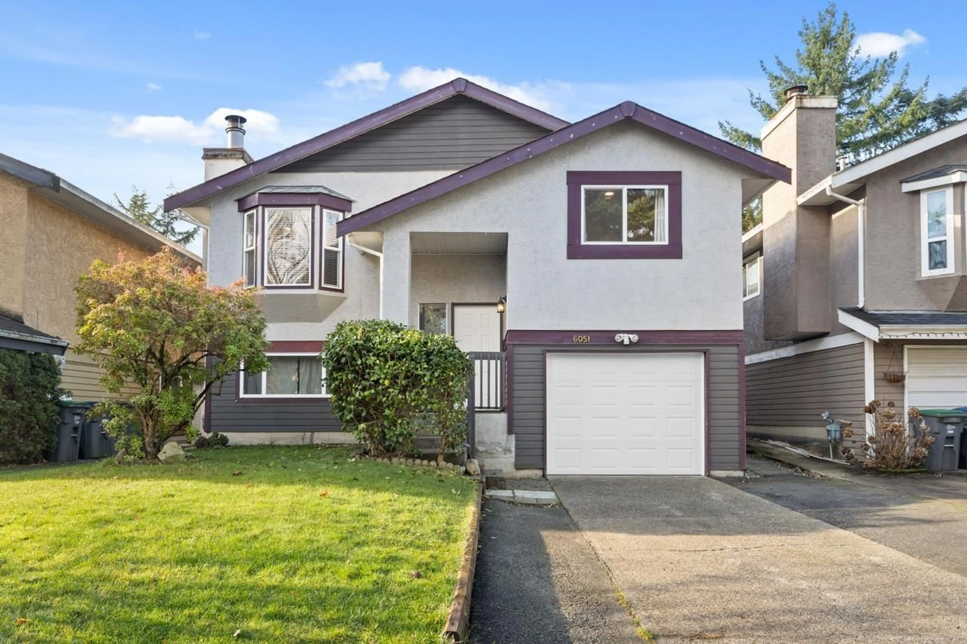 Home with vinyl exterior material, street for 6051 195A STREET, Surrey British Columbia V3S7K9