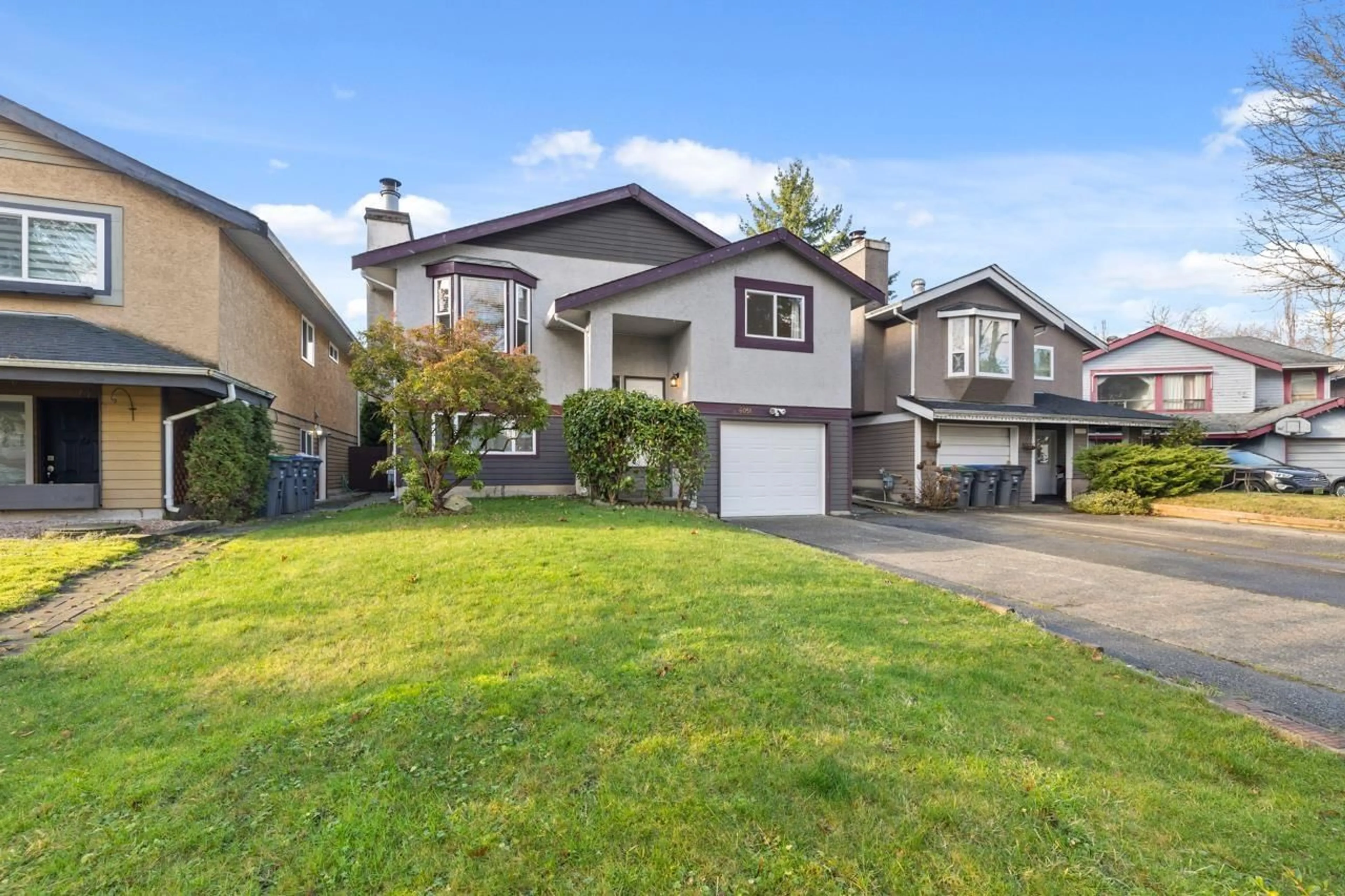 Home with vinyl exterior material, street for 6051 195A STREET, Surrey British Columbia V3S7K9