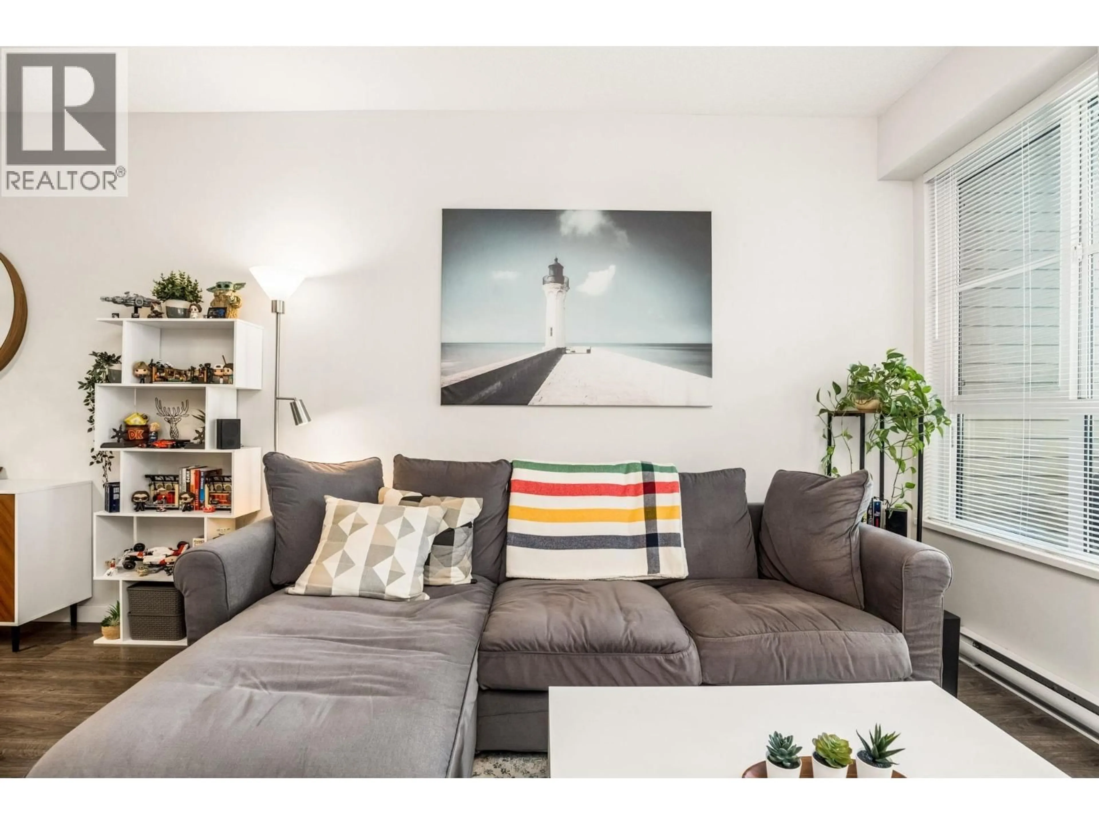 Living room with furniture, wood/laminate floor for 412 - 1152 WINDSOR MEWS, Coquitlam British Columbia V3B0N1