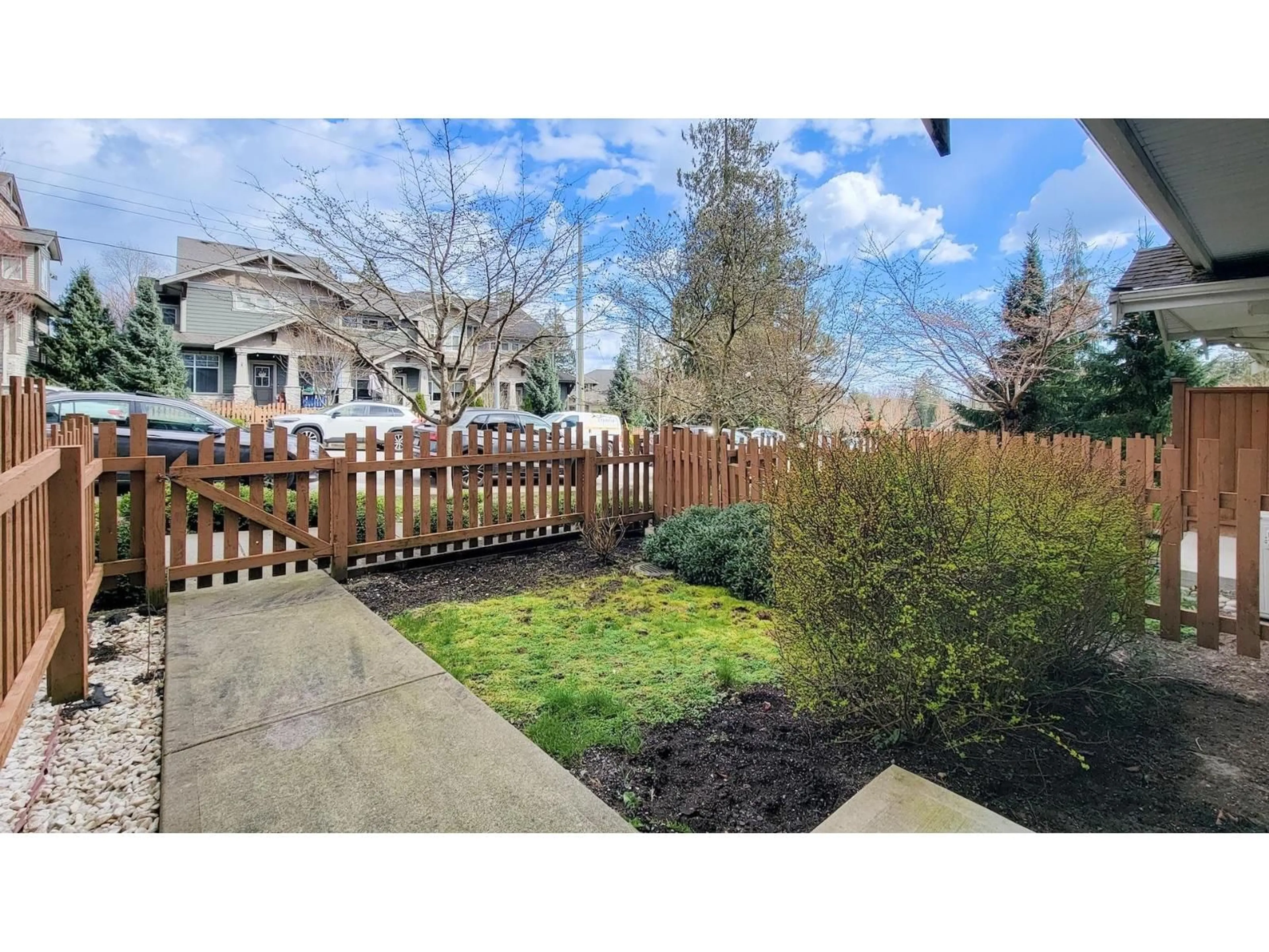 A pic from outside/outdoor area/front of a property/back of a property/a pic from drone, street for 4 - 7059 210 STREET, Langley British Columbia V2Y0T2
