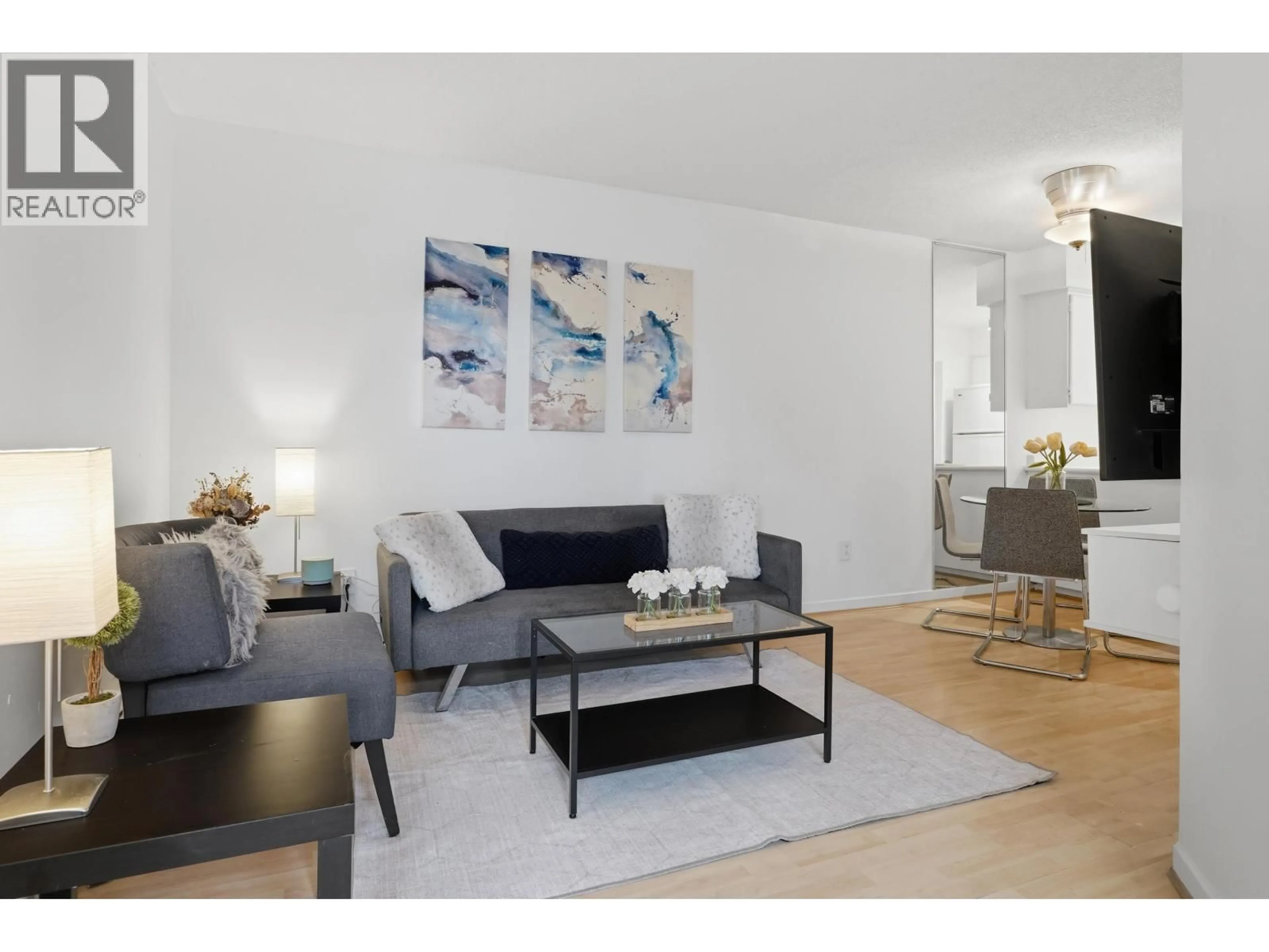 Living room with furniture, wood/laminate floor for 412 - 1718 NELSON STREET, Vancouver British Columbia V6G1M8