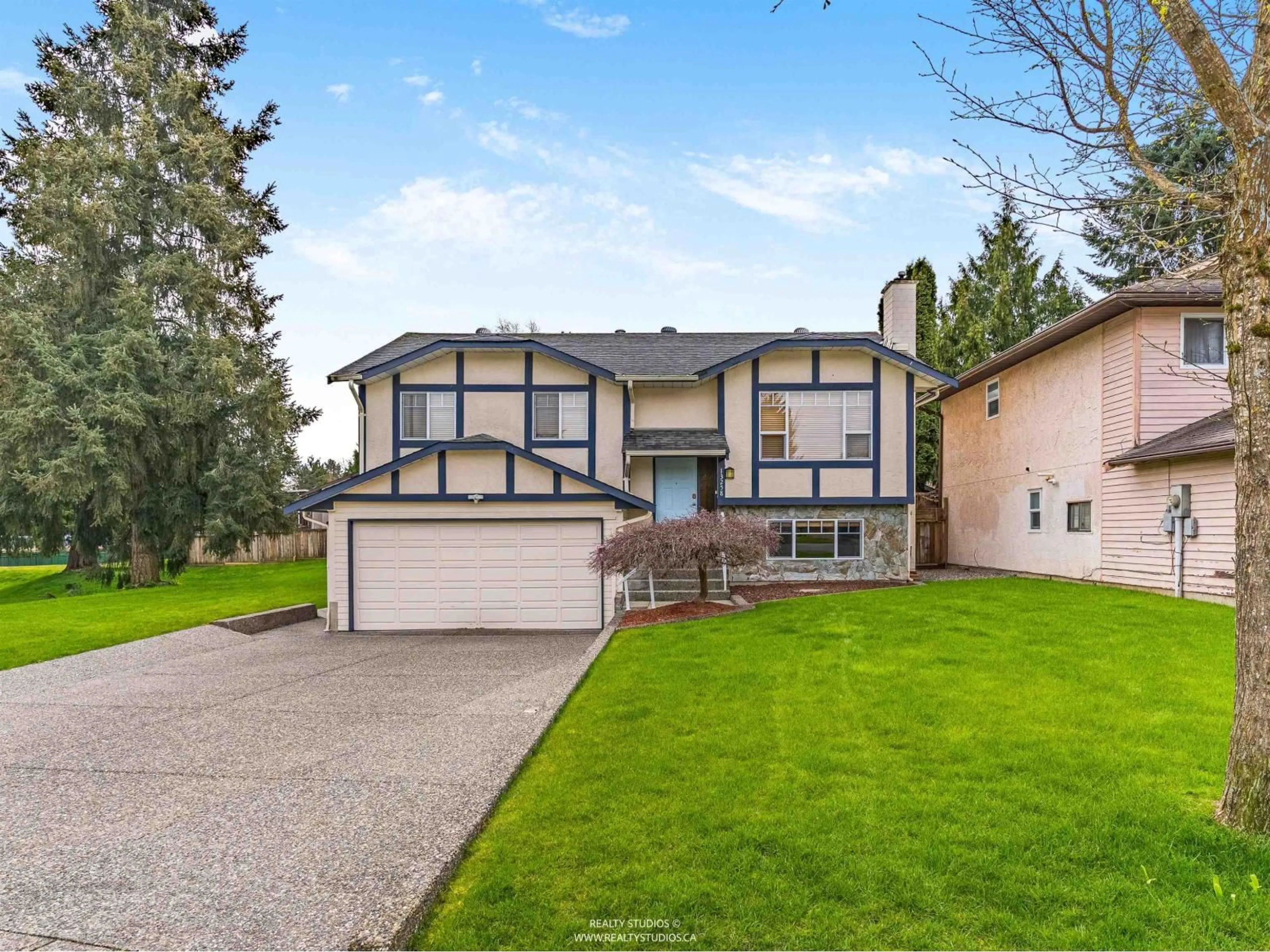 Home with vinyl exterior material, street for 13258 65B AVENUE, Surrey British Columbia V3W7Y7