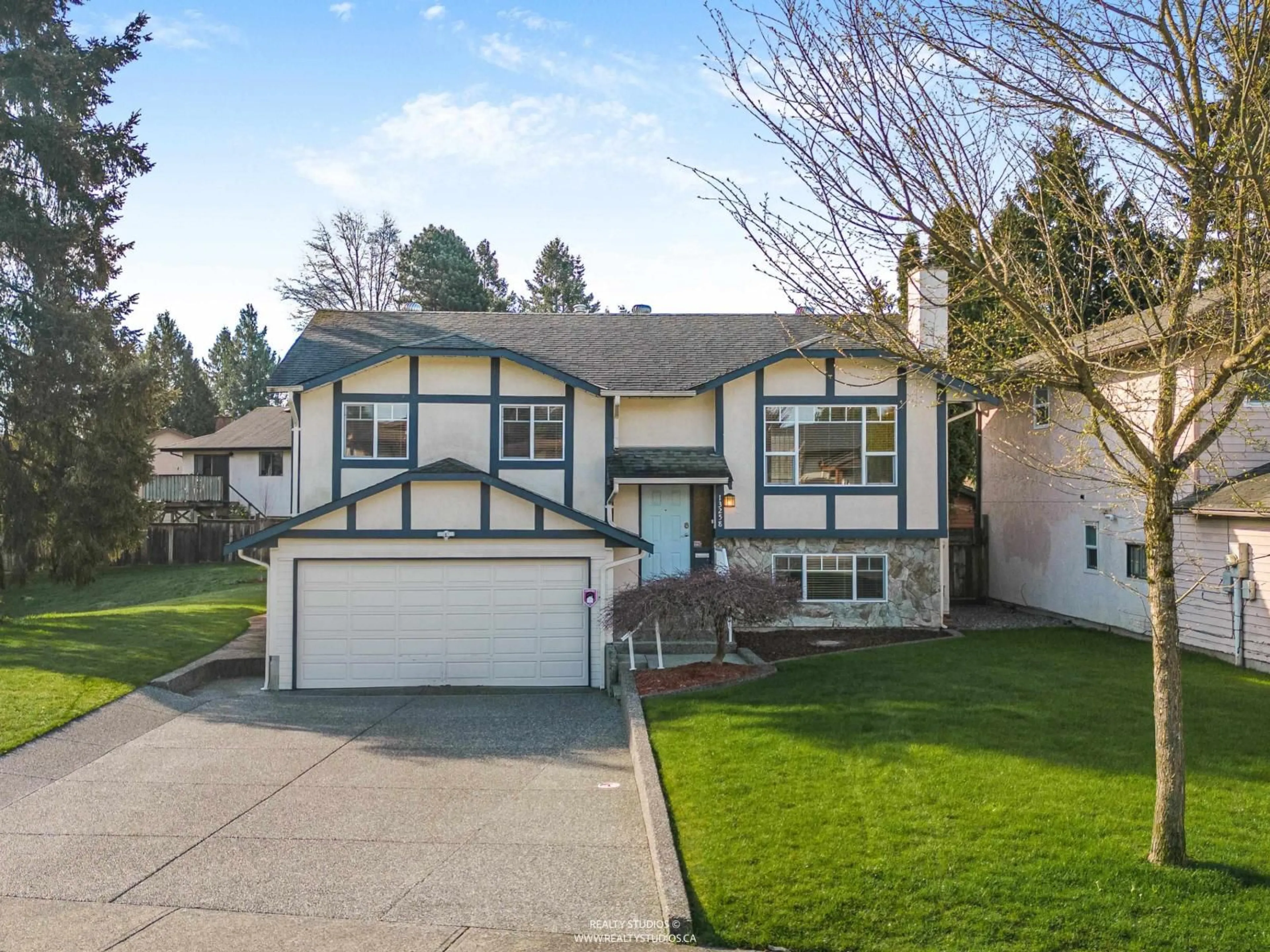 Home with vinyl exterior material, street for 13258 65B AVENUE, Surrey British Columbia V3W7Y7