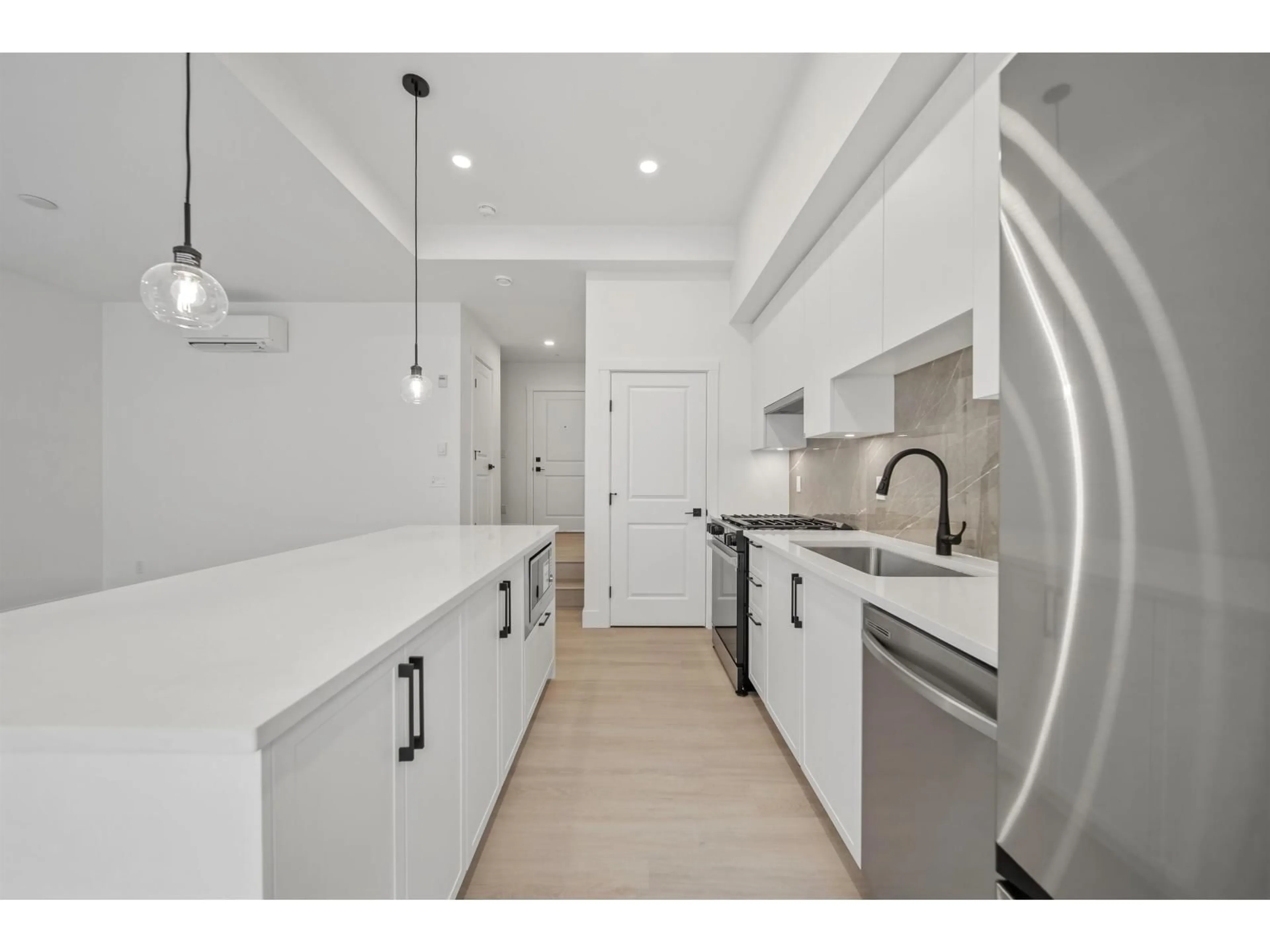 Open concept kitchen, ceramic/tile floor for 111 - 3465 146A STREET, Surrey British Columbia V0V0V0