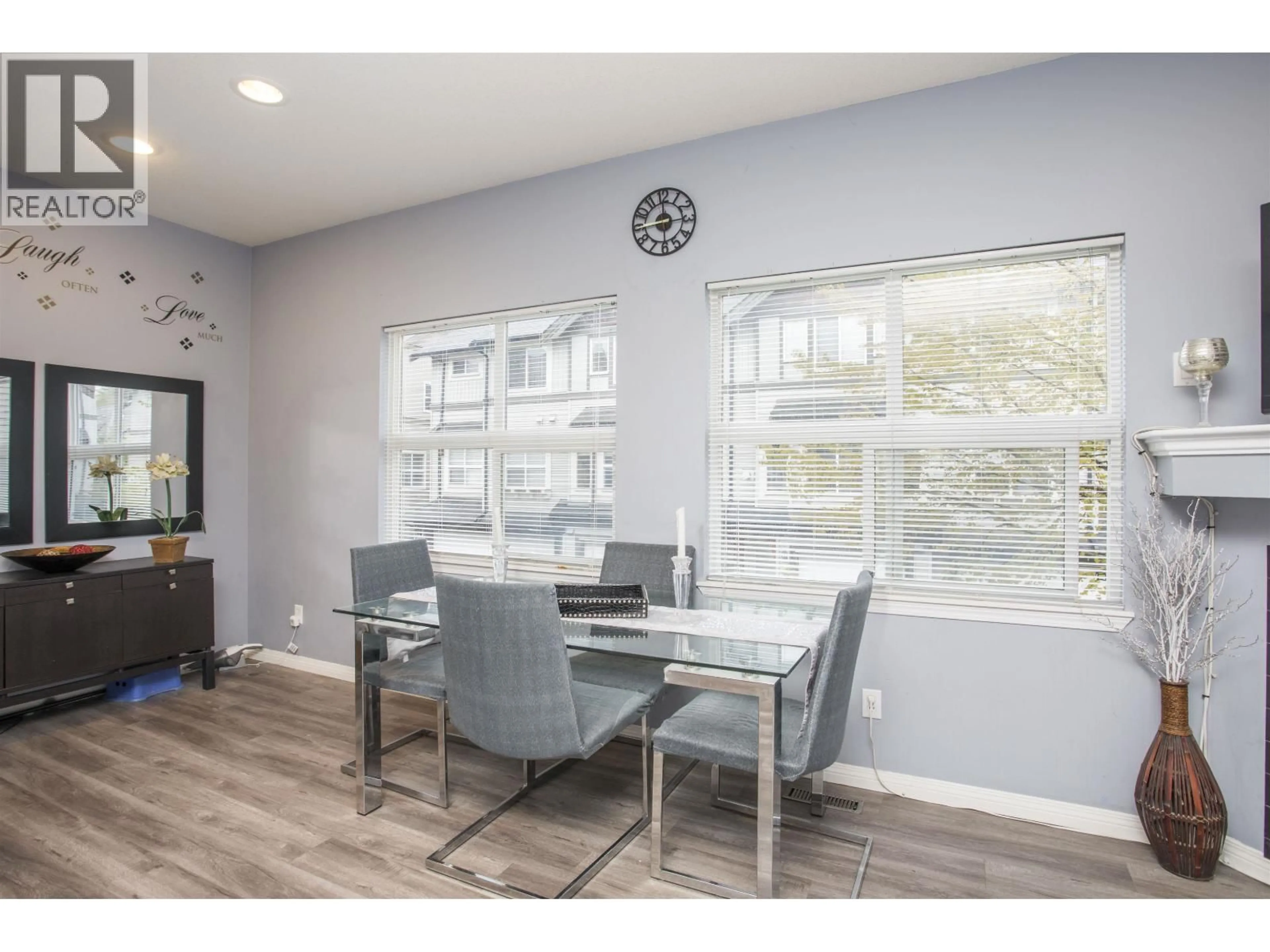 Dining room, wood/laminate floor for 106 - 1055 RIVERWOOD GATE, Port Coquitlam British Columbia V3B8C3