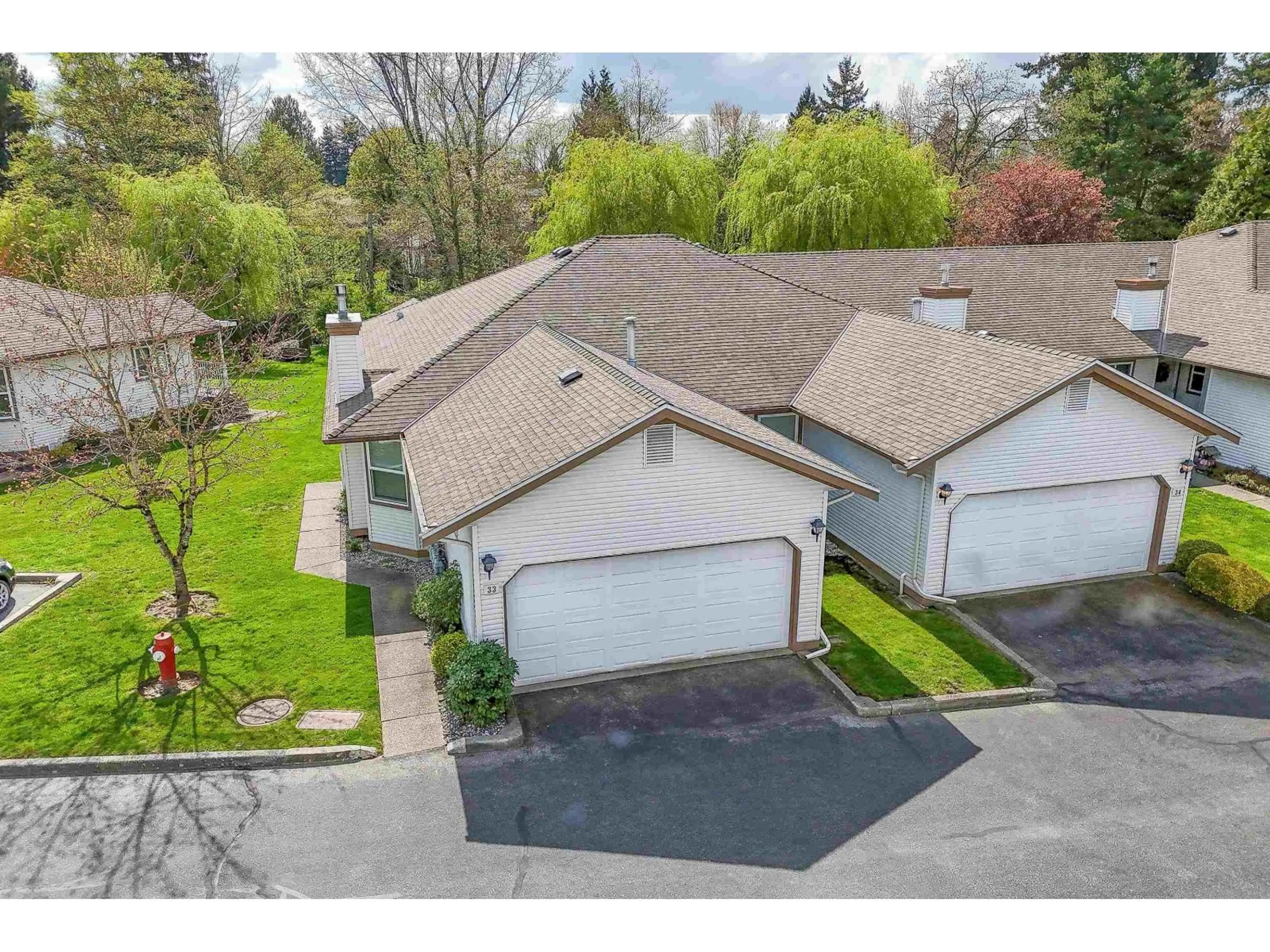A pic from outside/outdoor area/front of a property/back of a property/a pic from drone, street for 33 - 27435 29A AVENUE, Langley British Columbia V4W3M4
