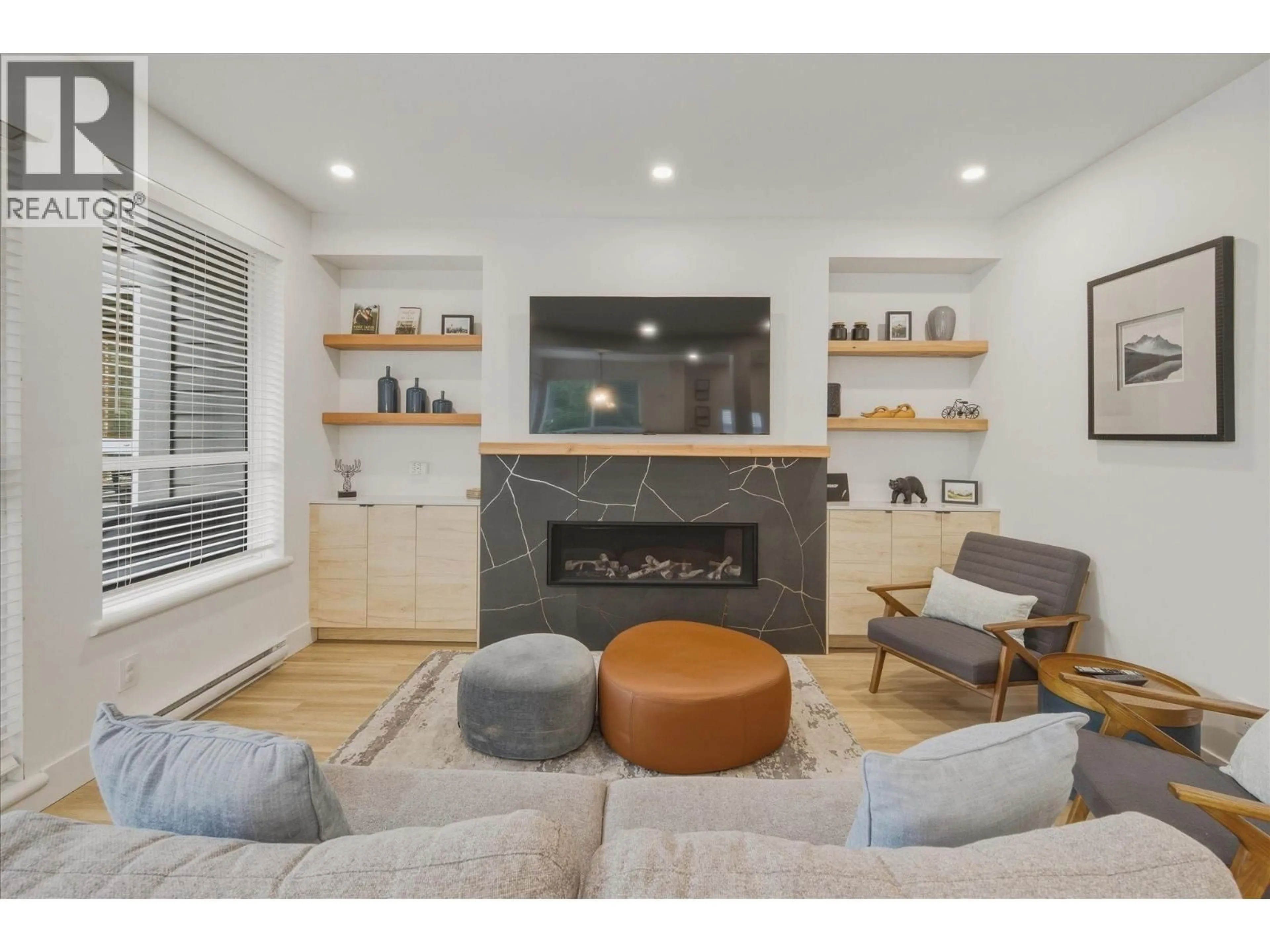 Living room with furniture, wood/laminate floor for 16 - 4628 BLACKCOMB WAY, Whistler British Columbia V0N1B4
