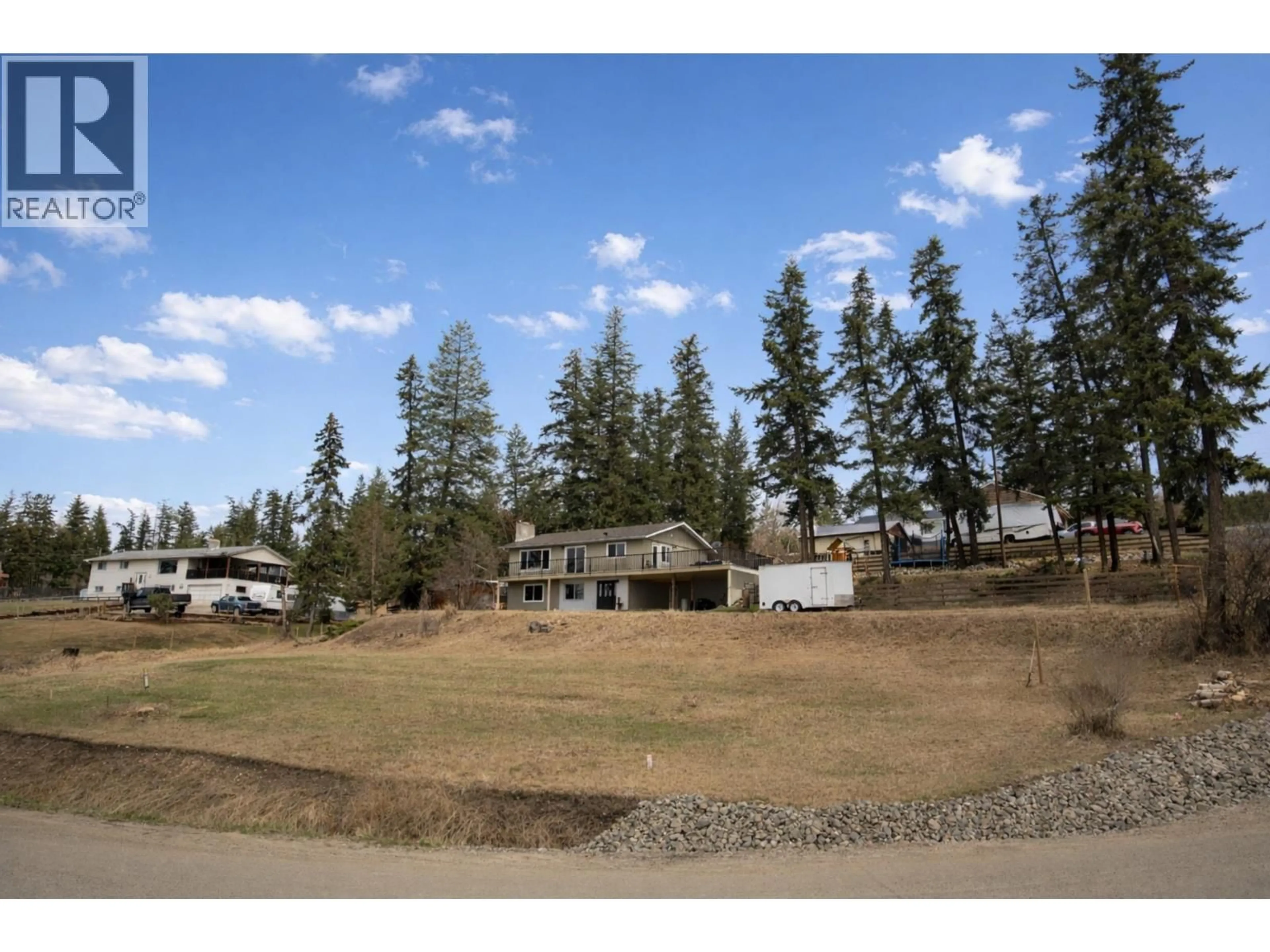 A pic from outside/outdoor area/front of a property/back of a property/a pic from drone, mountain view for 804 SHAW ROAD, Williams Lake British Columbia V2G3L1