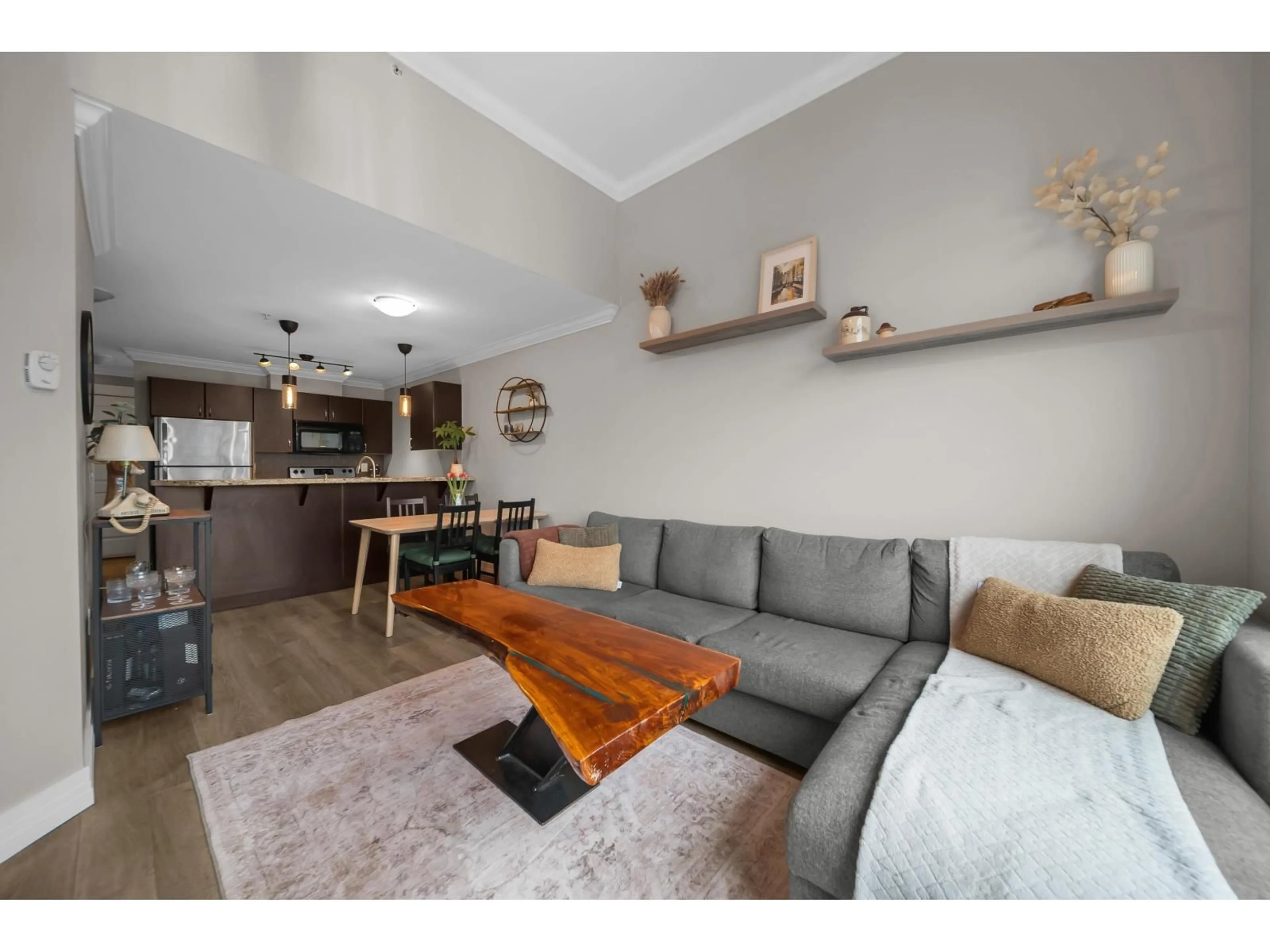 Living room with furniture, wood/laminate floor for 405 - 2515 PARK DRIVE, Abbotsford British Columbia V2S0B2