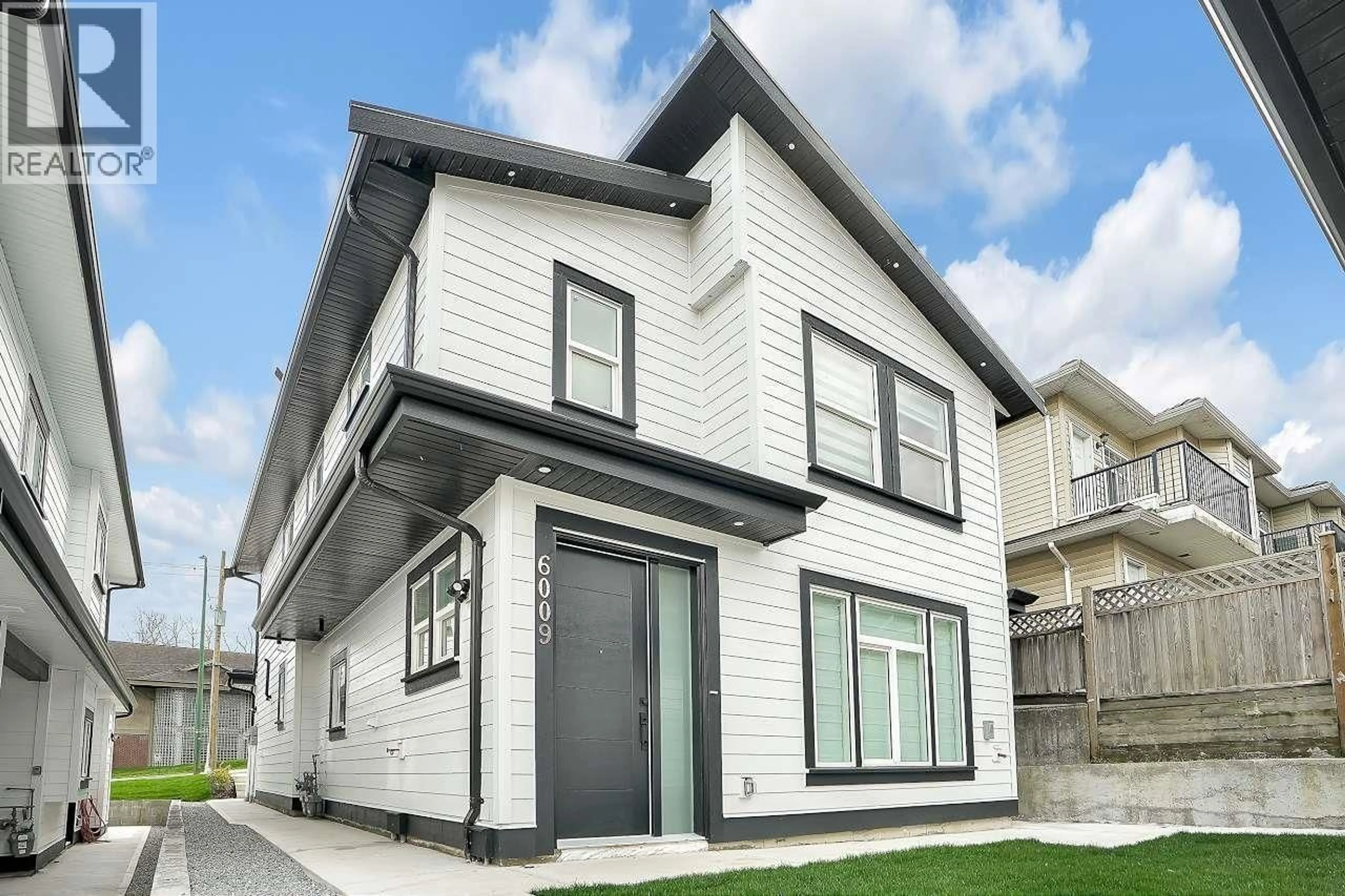 Home with vinyl exterior material, street for 6009 SPROTT STREET, Burnaby British Columbia V5G1T9