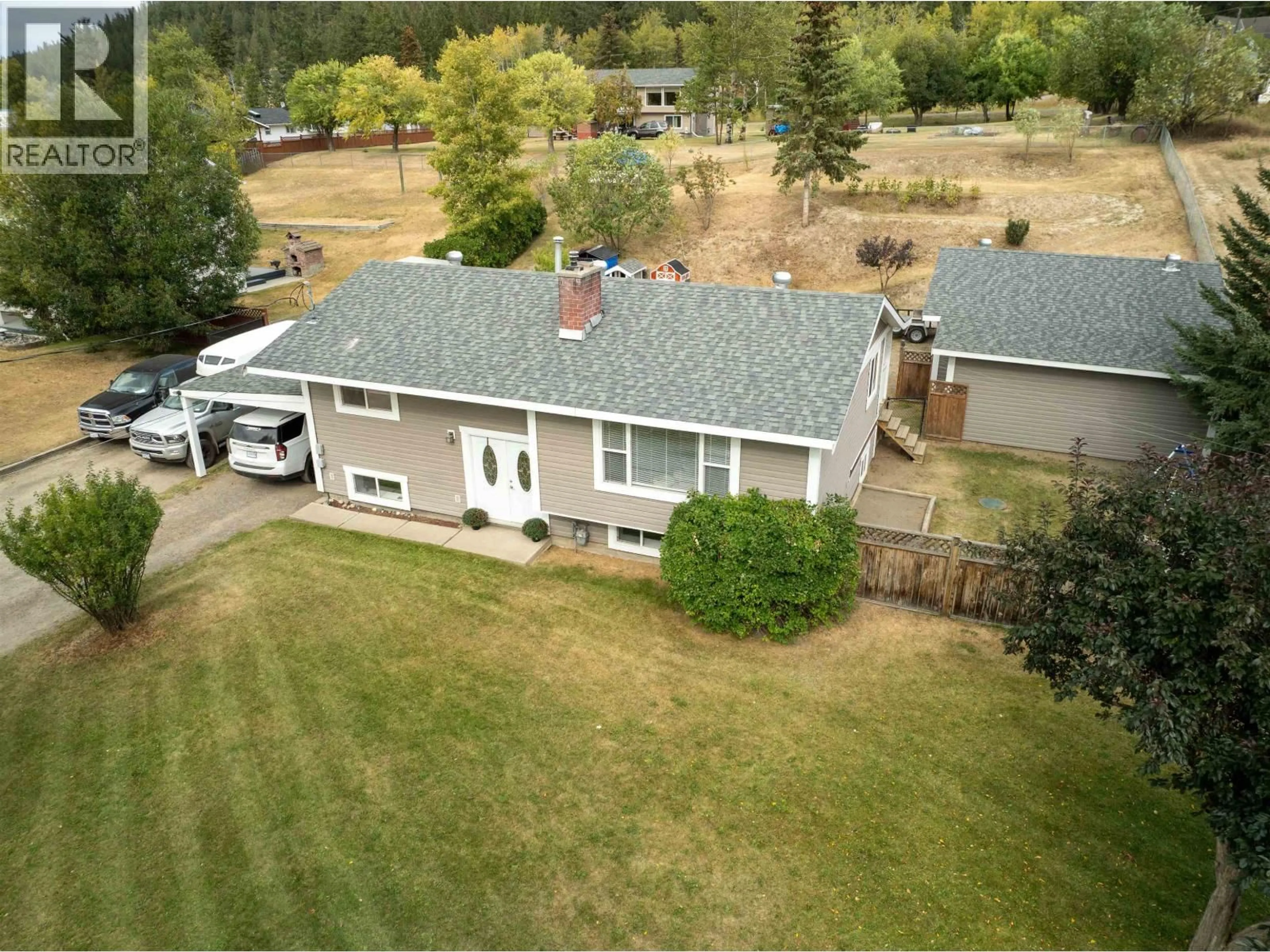 A pic from outside/outdoor area/front of a property/back of a property/a pic from drone, unknown for 5665 HORSE LAKE ROAD, 100 Mile House British Columbia V0K2E1