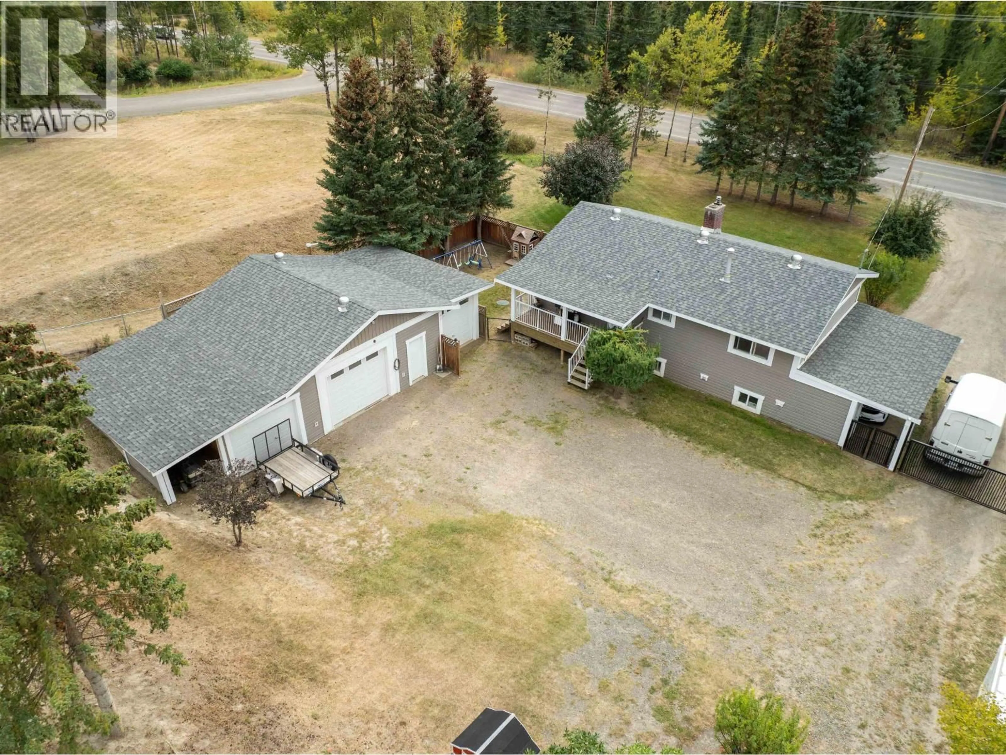 A pic from outside/outdoor area/front of a property/back of a property/a pic from drone, unknown for 5665 HORSE LAKE ROAD, 100 Mile House British Columbia V0K2E1