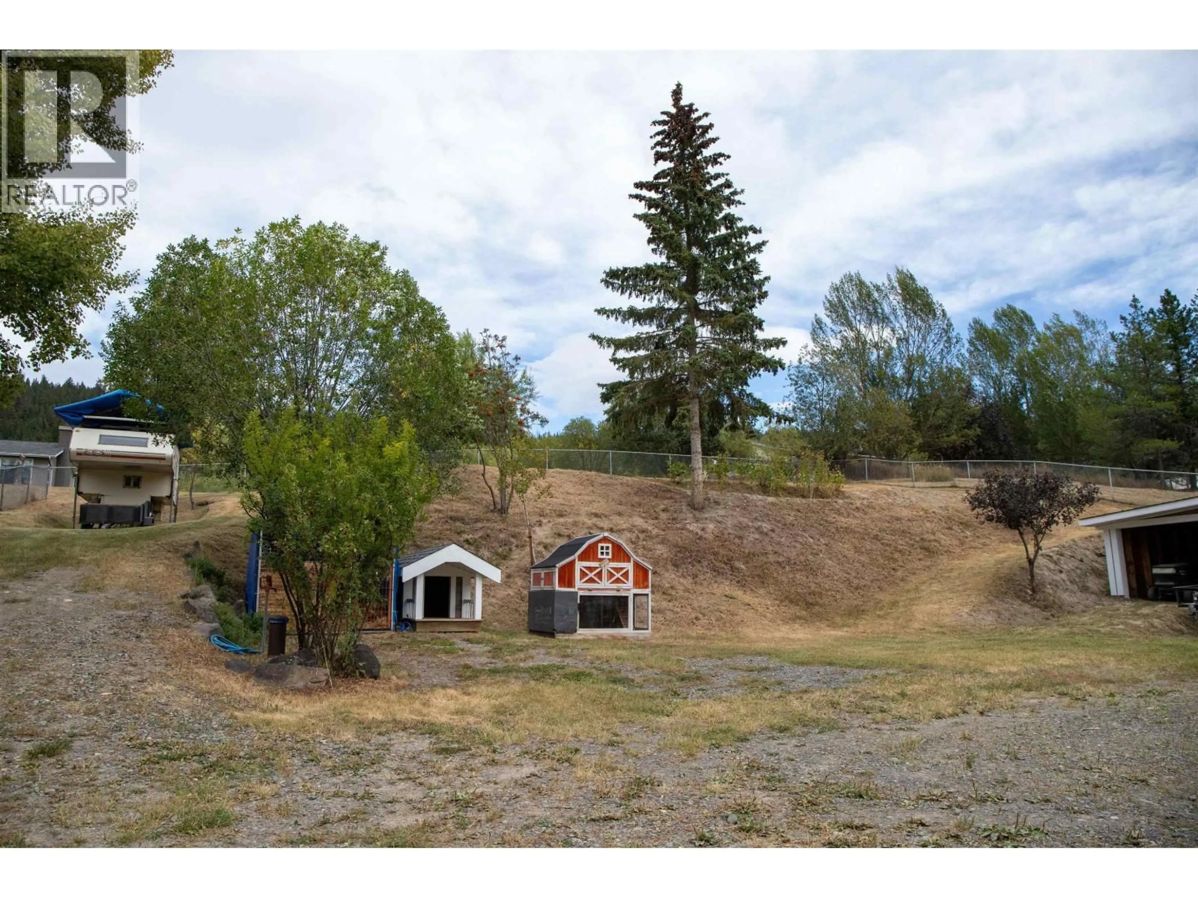 A pic from outside/outdoor area/front of a property/back of a property/a pic from drone, mountain view for 5665 HORSE LAKE ROAD, 100 Mile House British Columbia V0K2E1