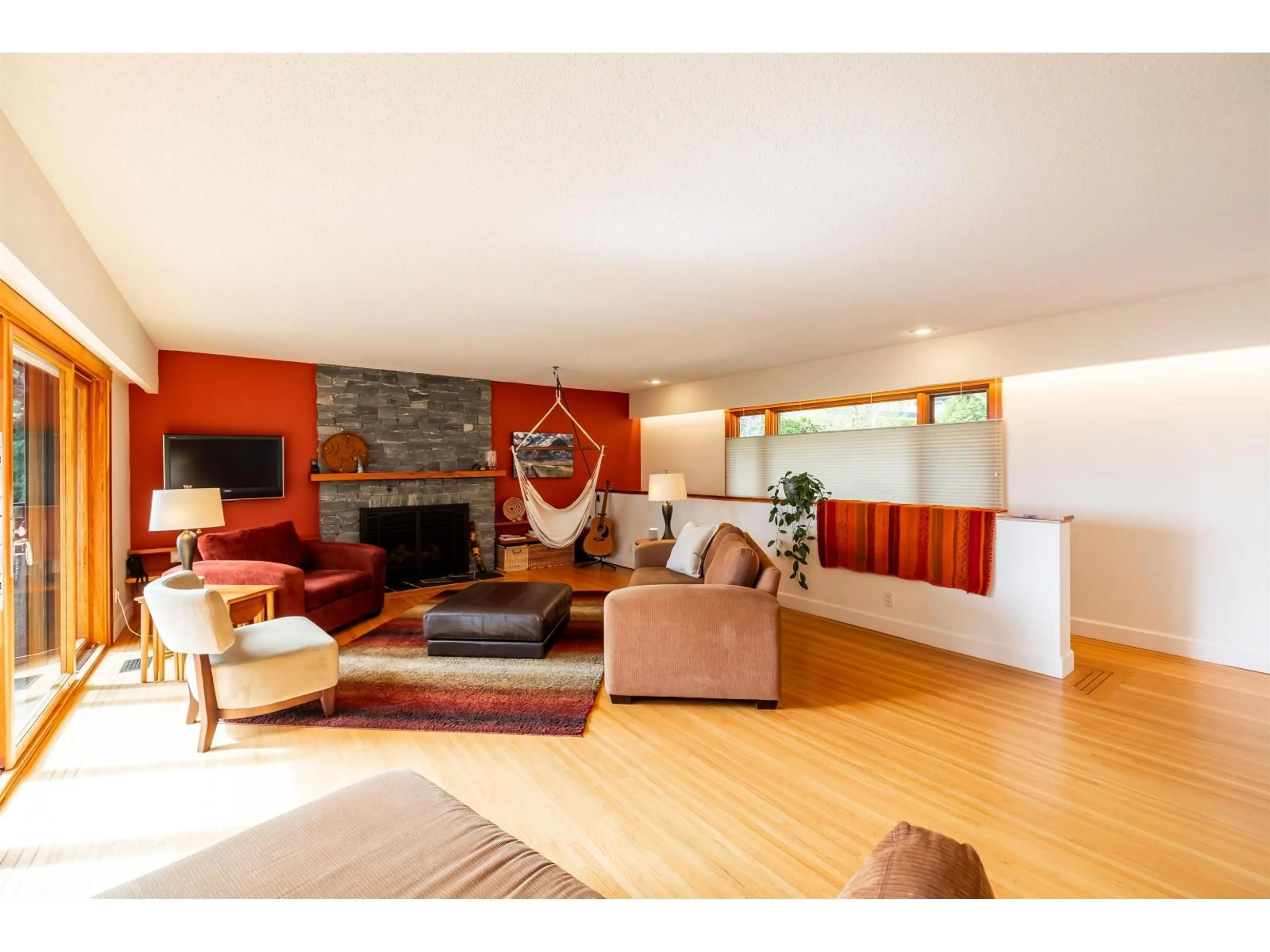 Living room with furniture, wood/laminate floor for 13464 56 AVENUE, Surrey British Columbia V3X2Z6