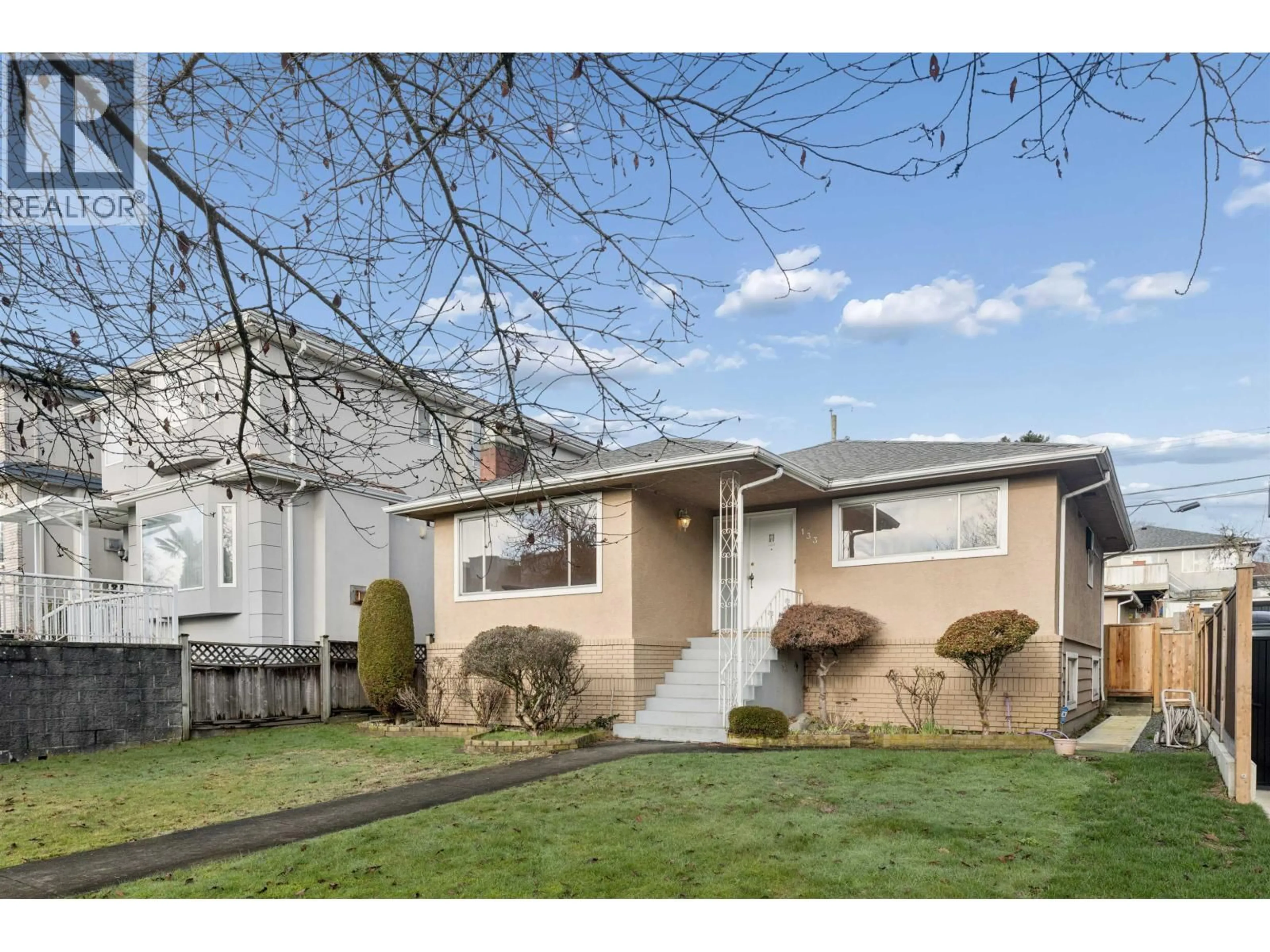Home with vinyl exterior material, street for 133 63RD AVENUE, Vancouver British Columbia V5X2H7