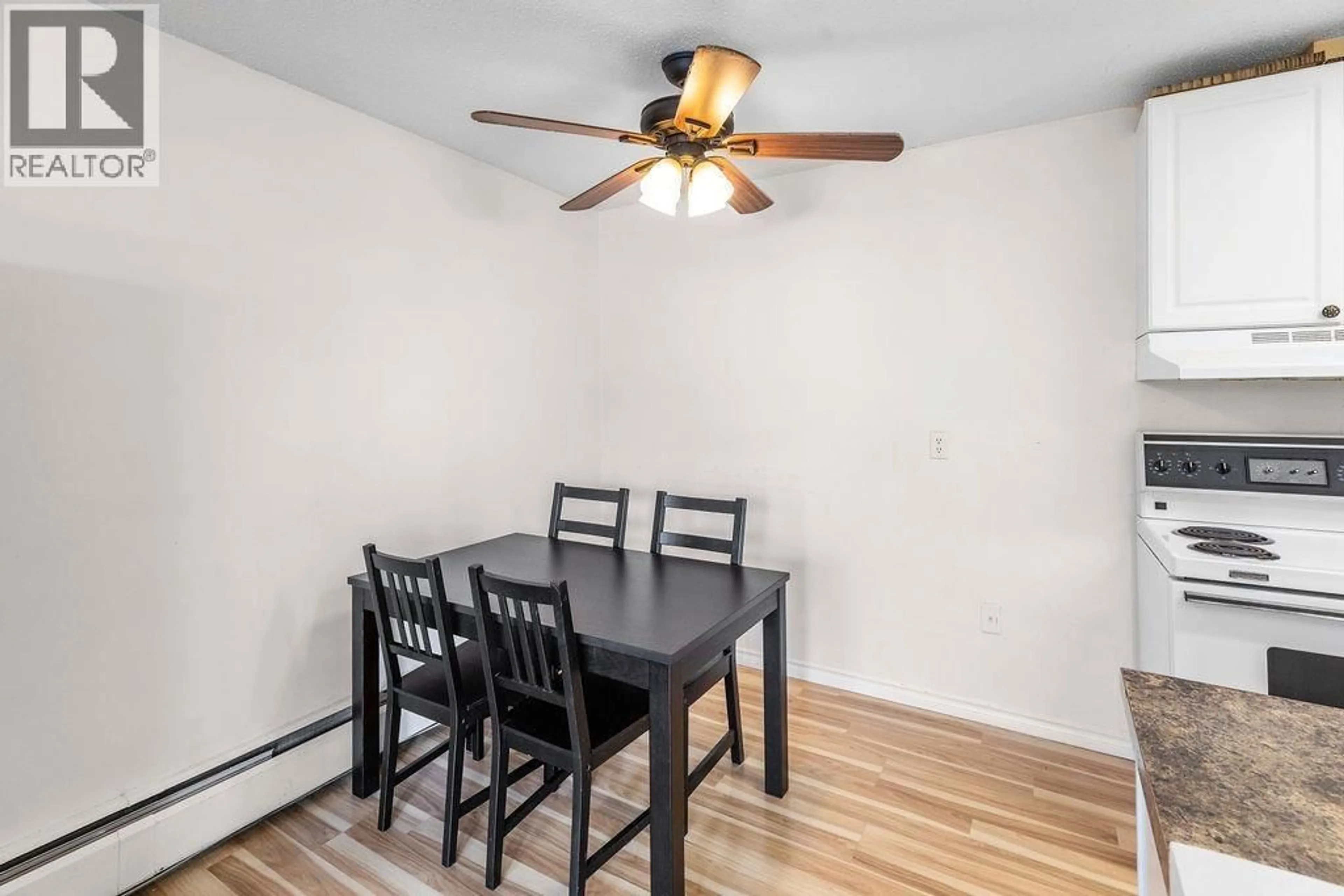 Dining room, wood/laminate floor for 102 - 8040 RYAN ROAD, Richmond British Columbia V7A2E5