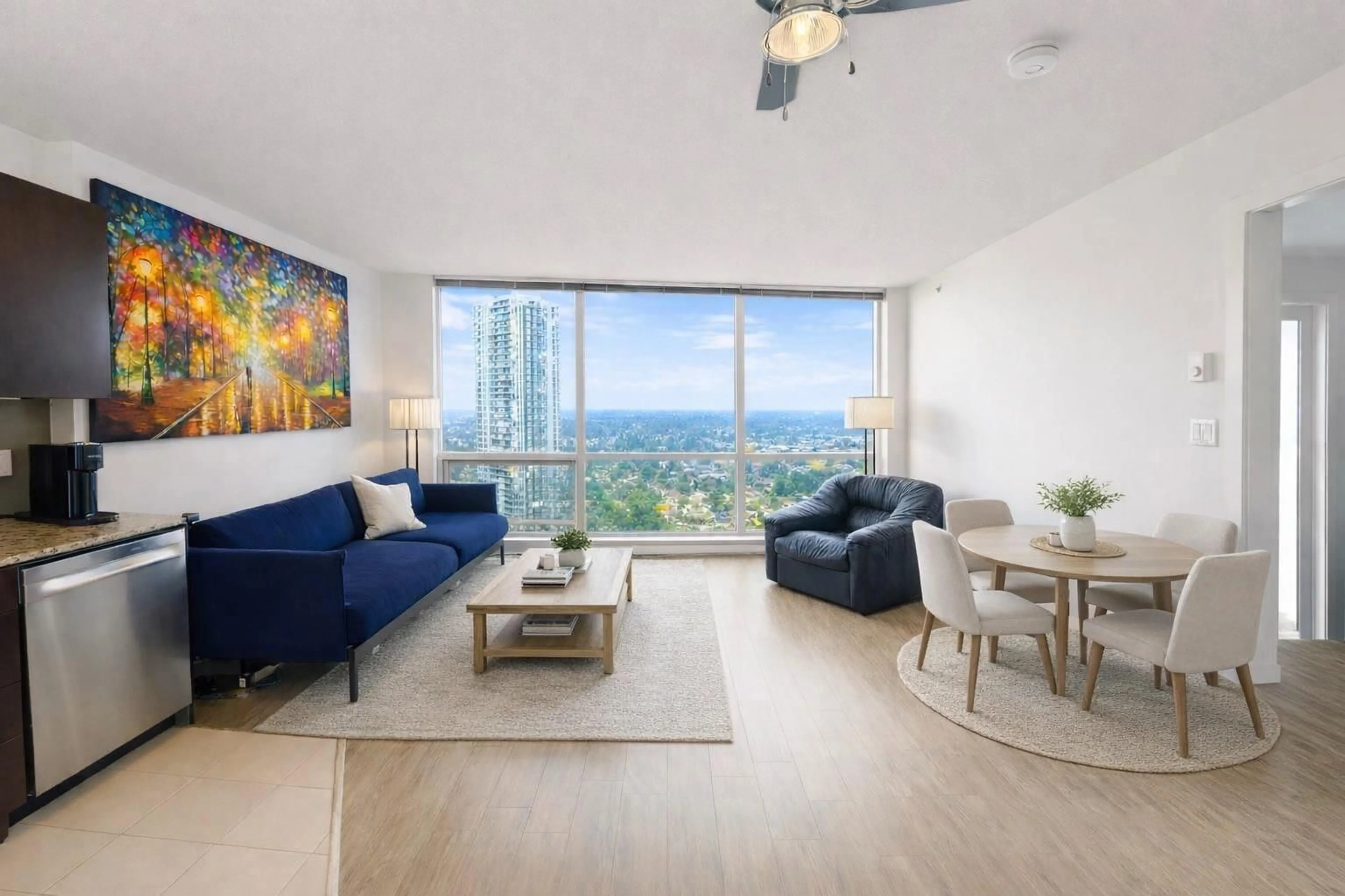 Living room with furniture, wood/laminate floor for 2810 - 13618 100 AVENUE, Surrey British Columbia V3T0A8