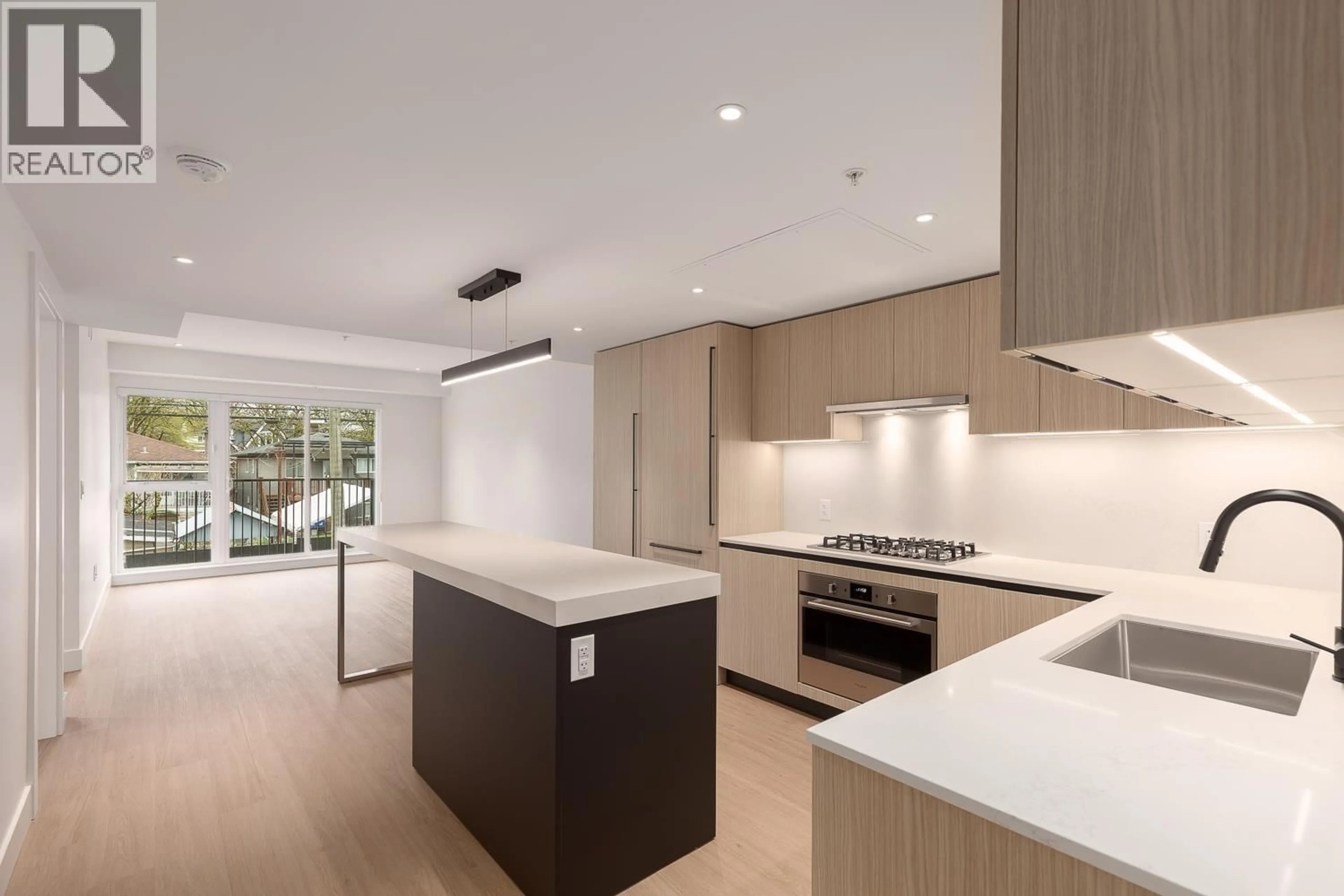 Open concept kitchen, unknown for 210 - 2235 BROADWAY, Vancouver British Columbia V5N0J5