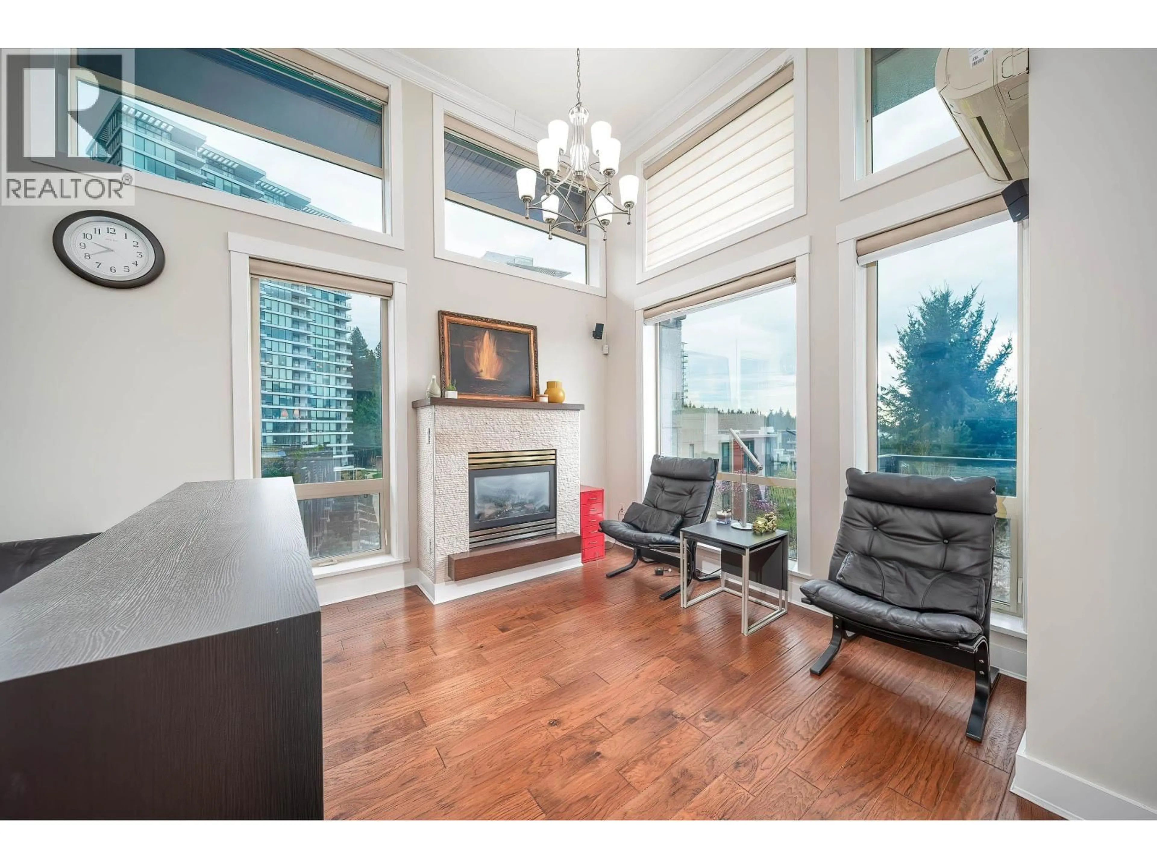Living room with furniture, wood/laminate floor for 406 - 5779 BIRNEY AVENUE, Vancouver British Columbia V6S0A3