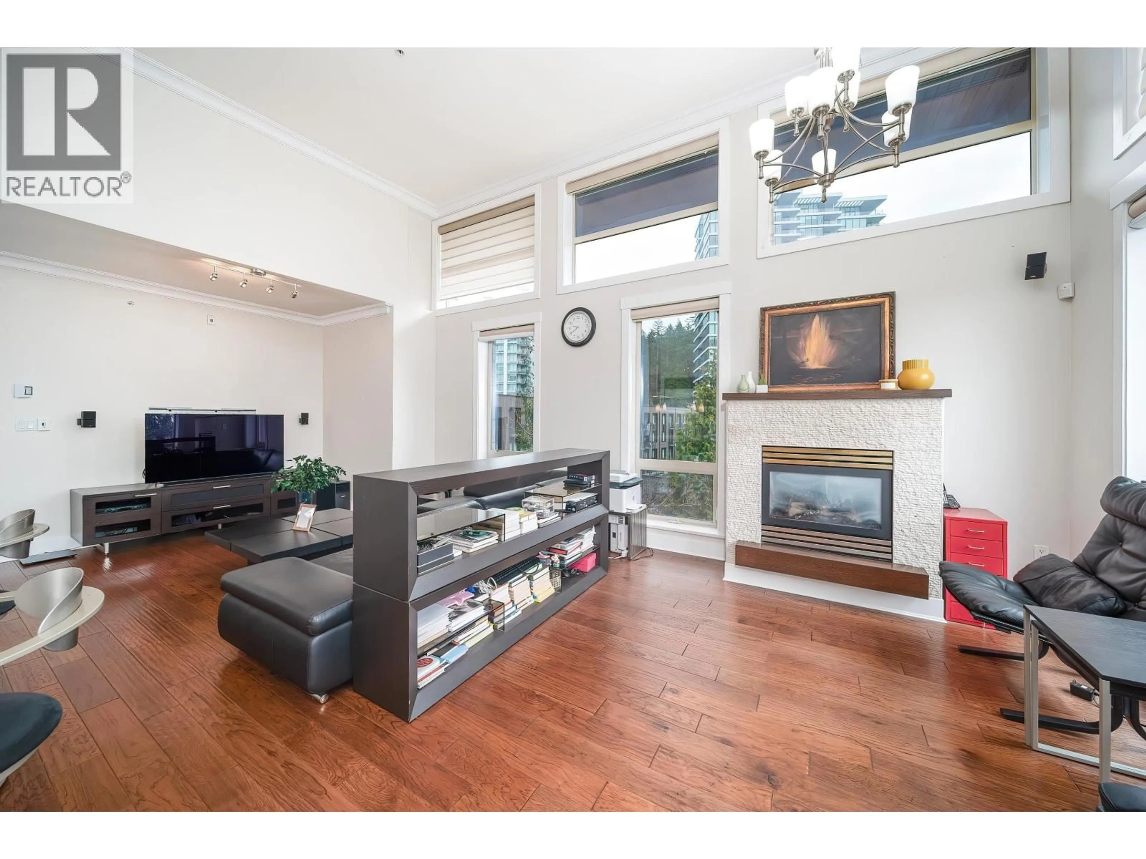 Living room with furniture, wood/laminate floor for 406 - 5779 BIRNEY AVENUE, Vancouver British Columbia V6S0A3