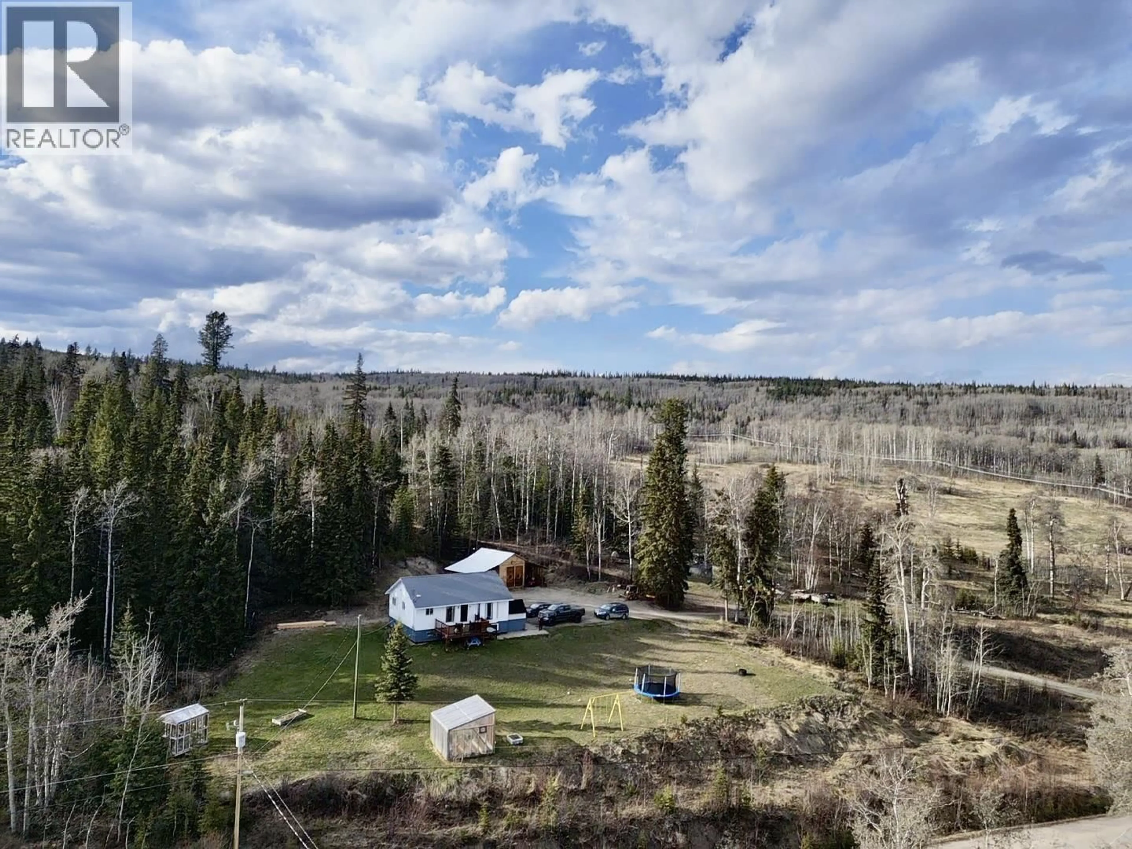 A pic from outside/outdoor area/front of a property/back of a property/a pic from drone, forest/trees view for 1408 FRANCOIS LAKE ROAD, Fraser Lake British Columbia V0J1S0