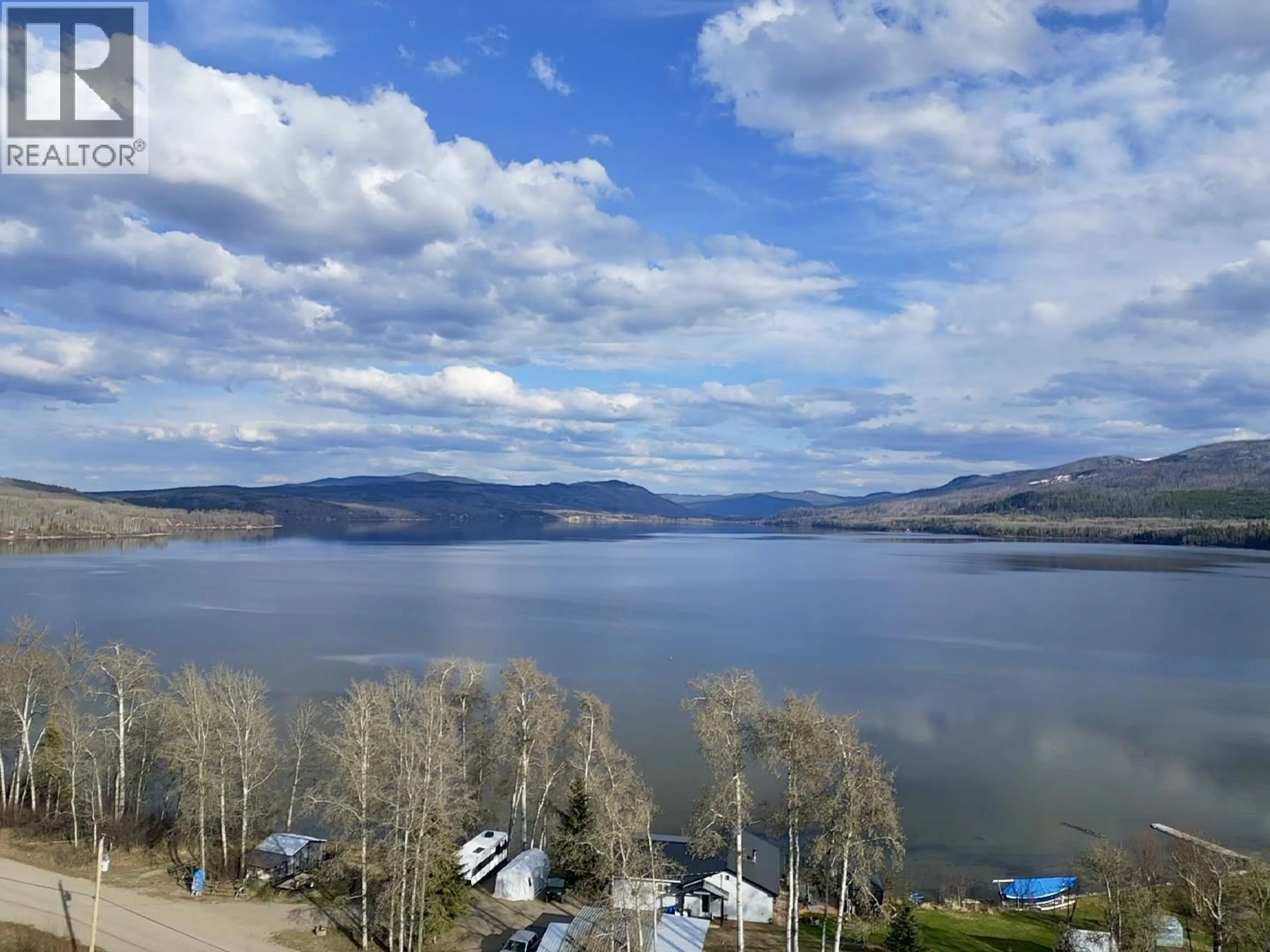A pic from outside/outdoor area/front of a property/back of a property/a pic from drone, water/lake/river/ocean view for 1408 FRANCOIS LAKE ROAD, Fraser Lake British Columbia V0J1S0