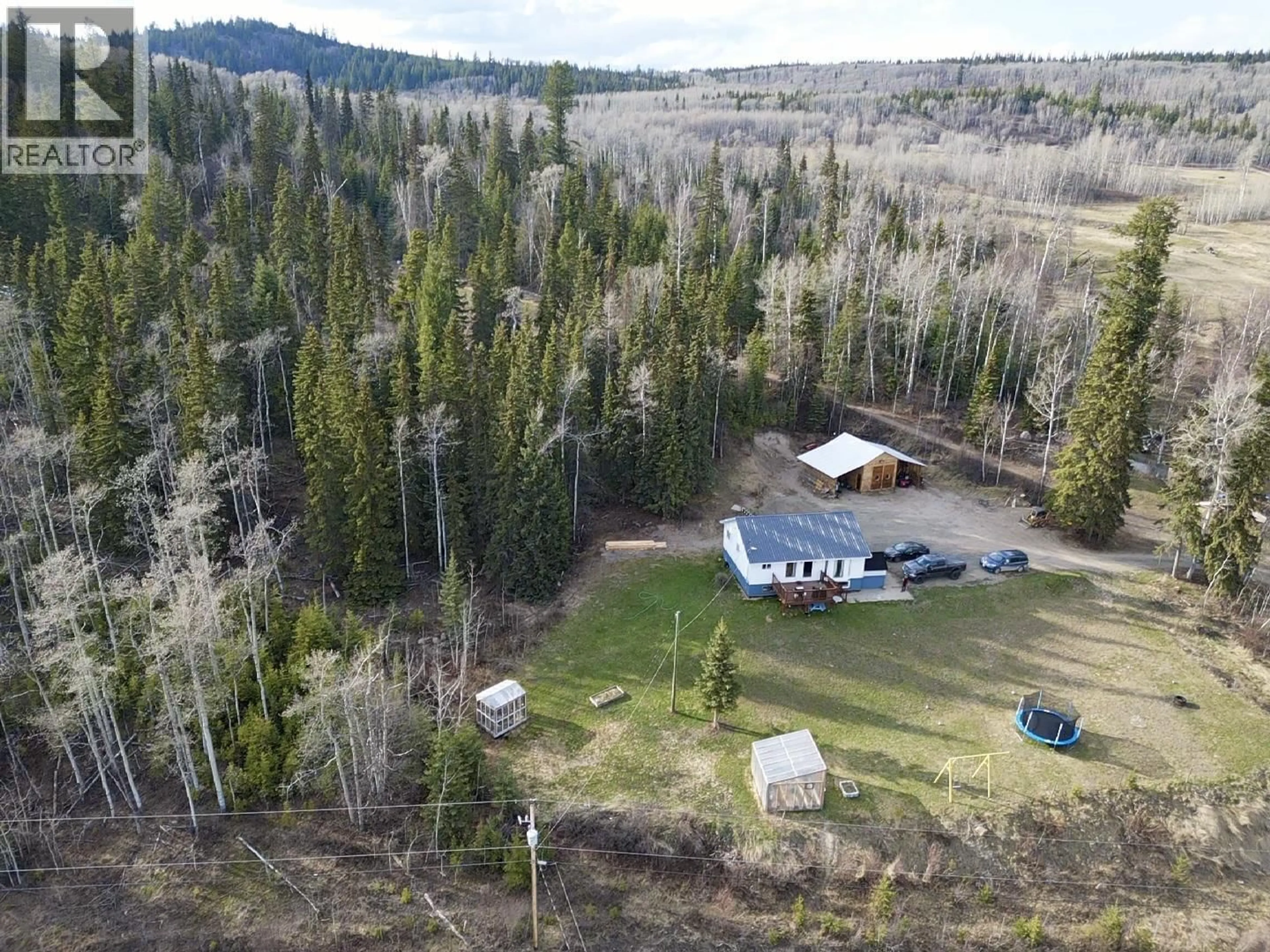 A pic from outside/outdoor area/front of a property/back of a property/a pic from drone, forest/trees view for 1408 FRANCOIS LAKE ROAD, Fraser Lake British Columbia V0J1S0