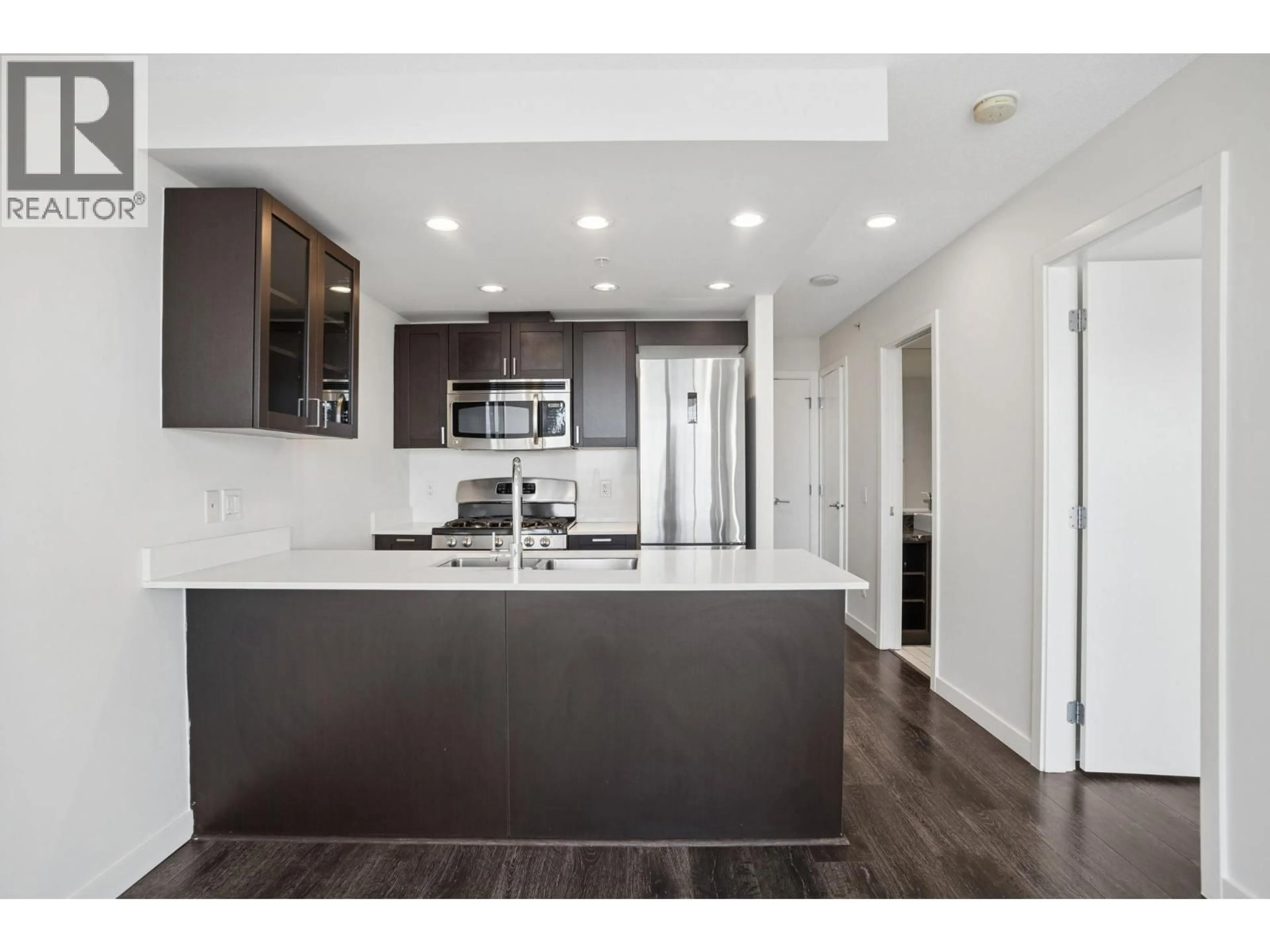 Open concept kitchen, wood/laminate floor for 1001 - 4815 ELDORADO MEWS, Vancouver British Columbia V5R0B2
