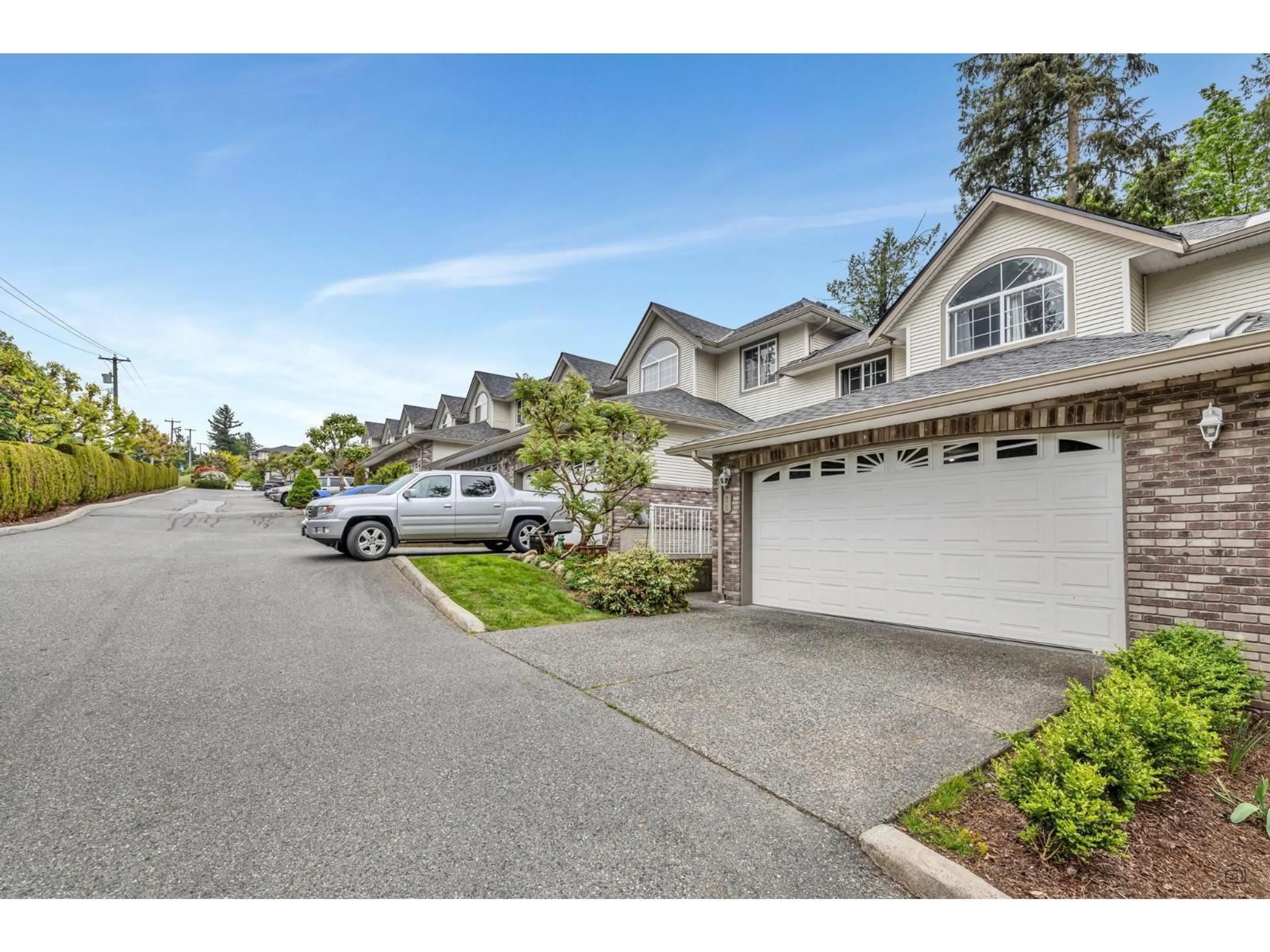 A pic from outside/outdoor area/front of a property/back of a property/a pic from drone, street for 76 - 32777 CHILCOTIN DRIVE, Abbotsford British Columbia V2T5W4