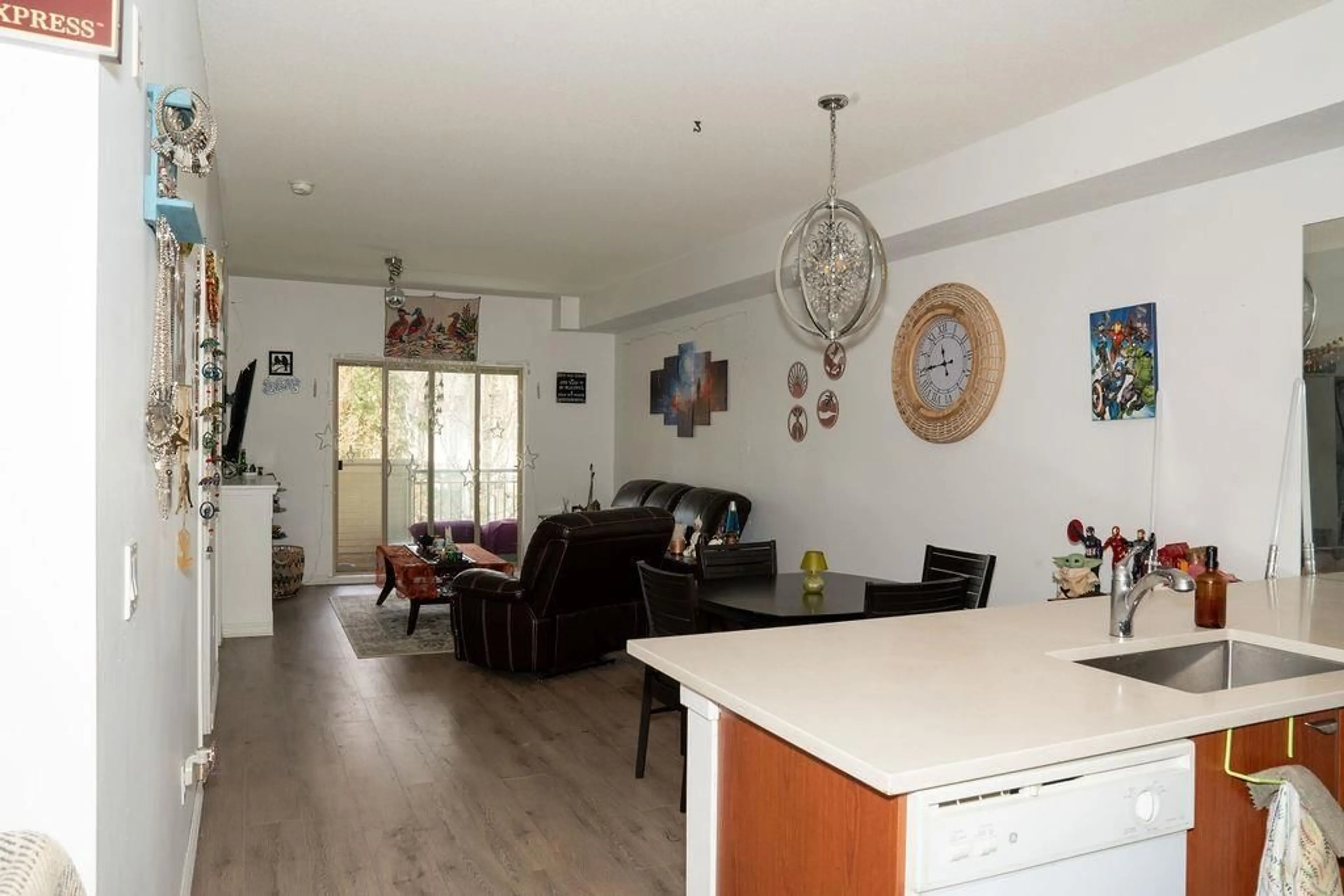 Open concept kitchen, wood/laminate floor for 406 - 10088 148 STREET, Surrey British Columbia V3R3M9