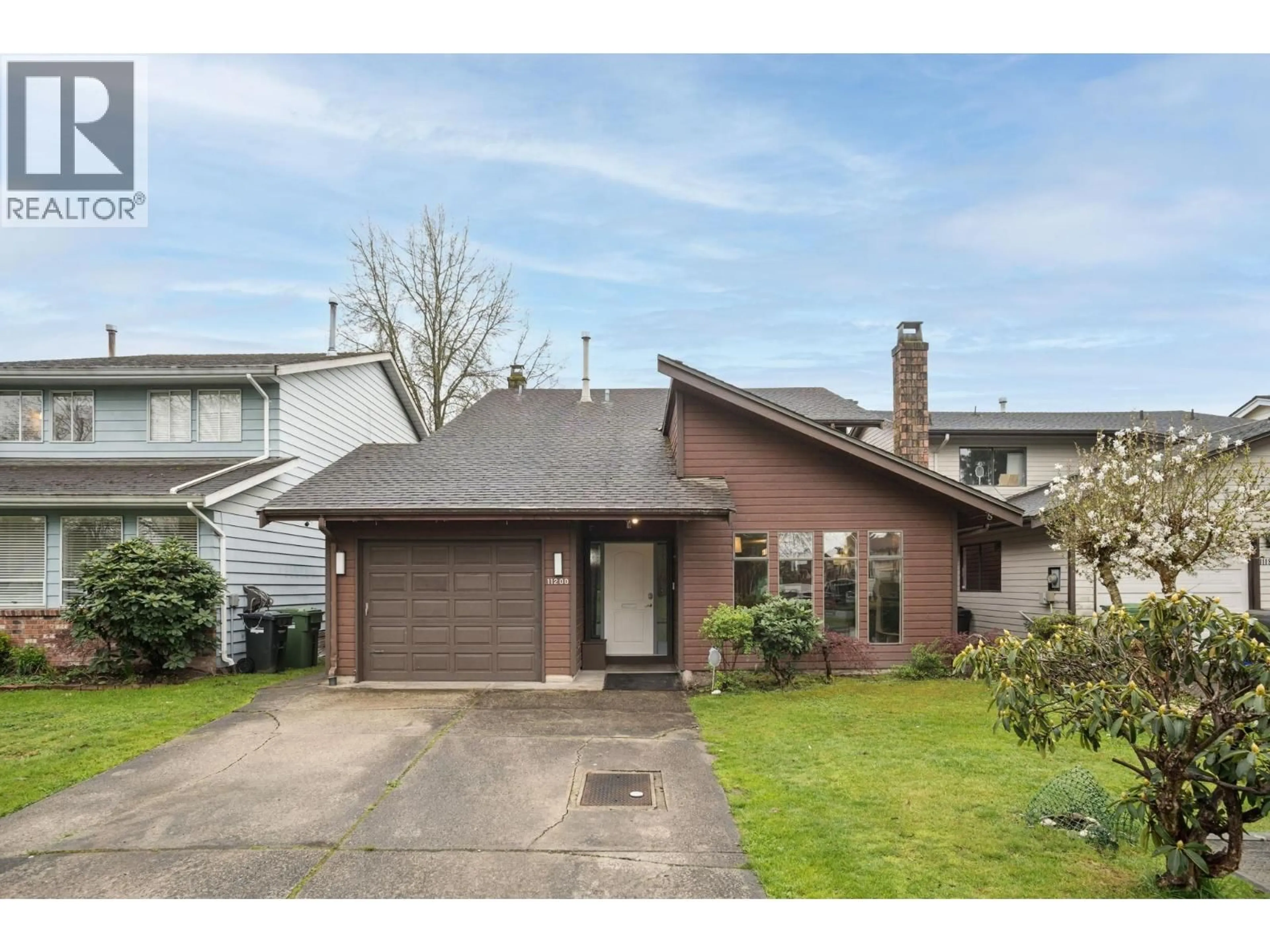 Home with vinyl exterior material, street for 11200 MELLIS DRIVE, Richmond British Columbia V6X1L7
