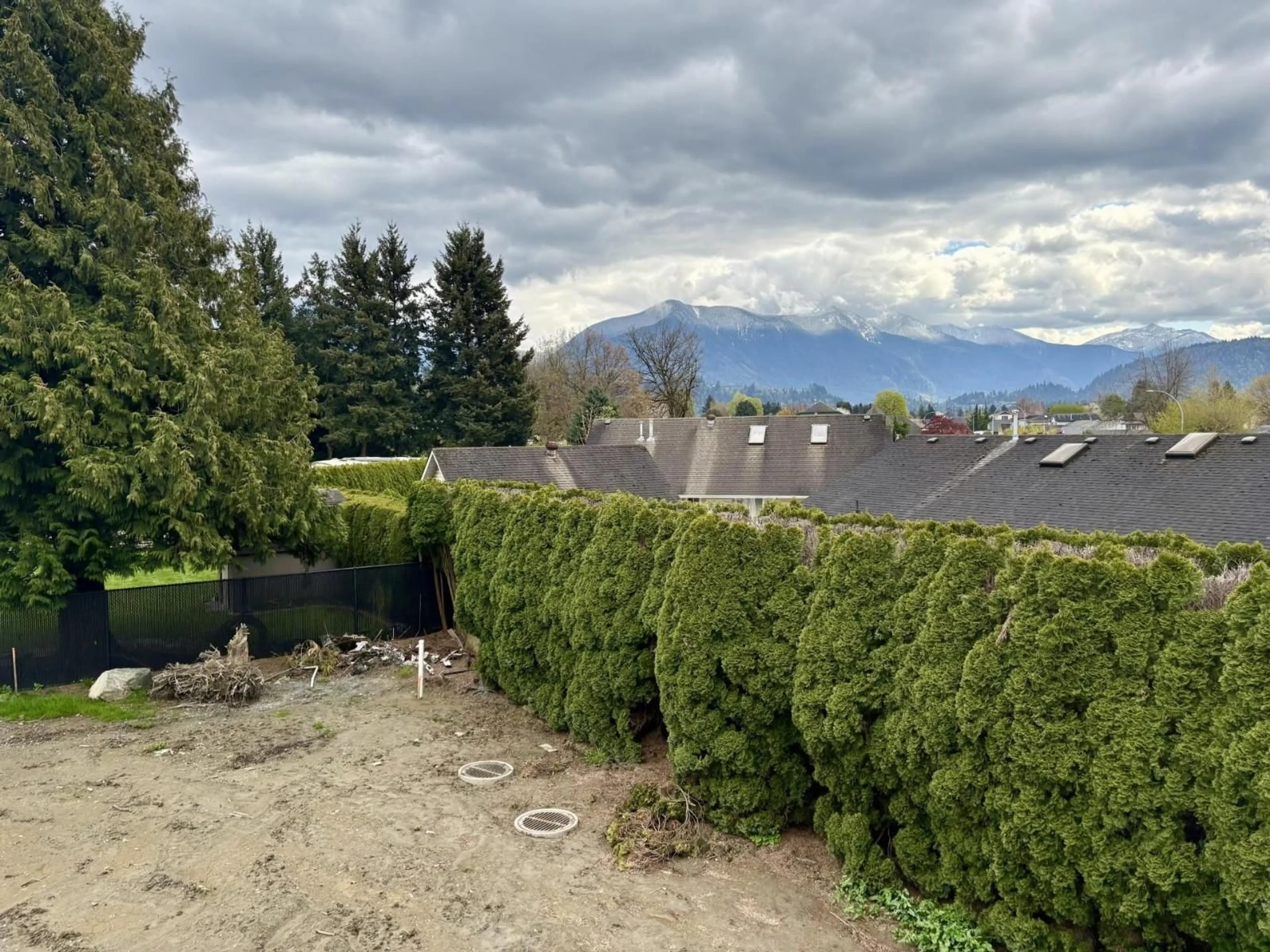 A pic from outside/outdoor area/front of a property/back of a property/a pic from drone, mountain view for 7033 EDEN DRIVE, Chilliwack British Columbia V2R1E6