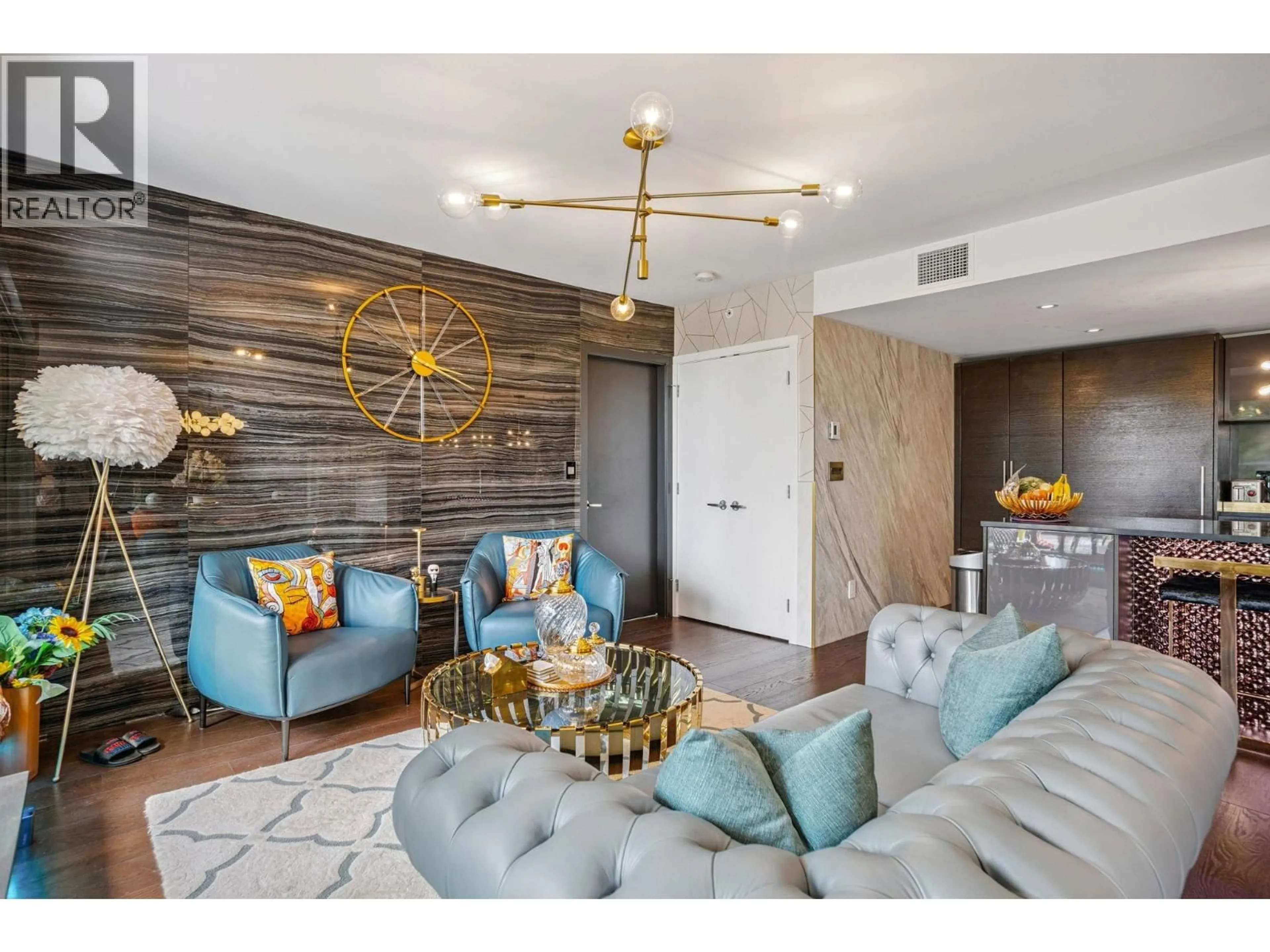 Living room with furniture, wood/laminate floor for 304 - 7128 ADERA STREET, Vancouver British Columbia V6P0H6