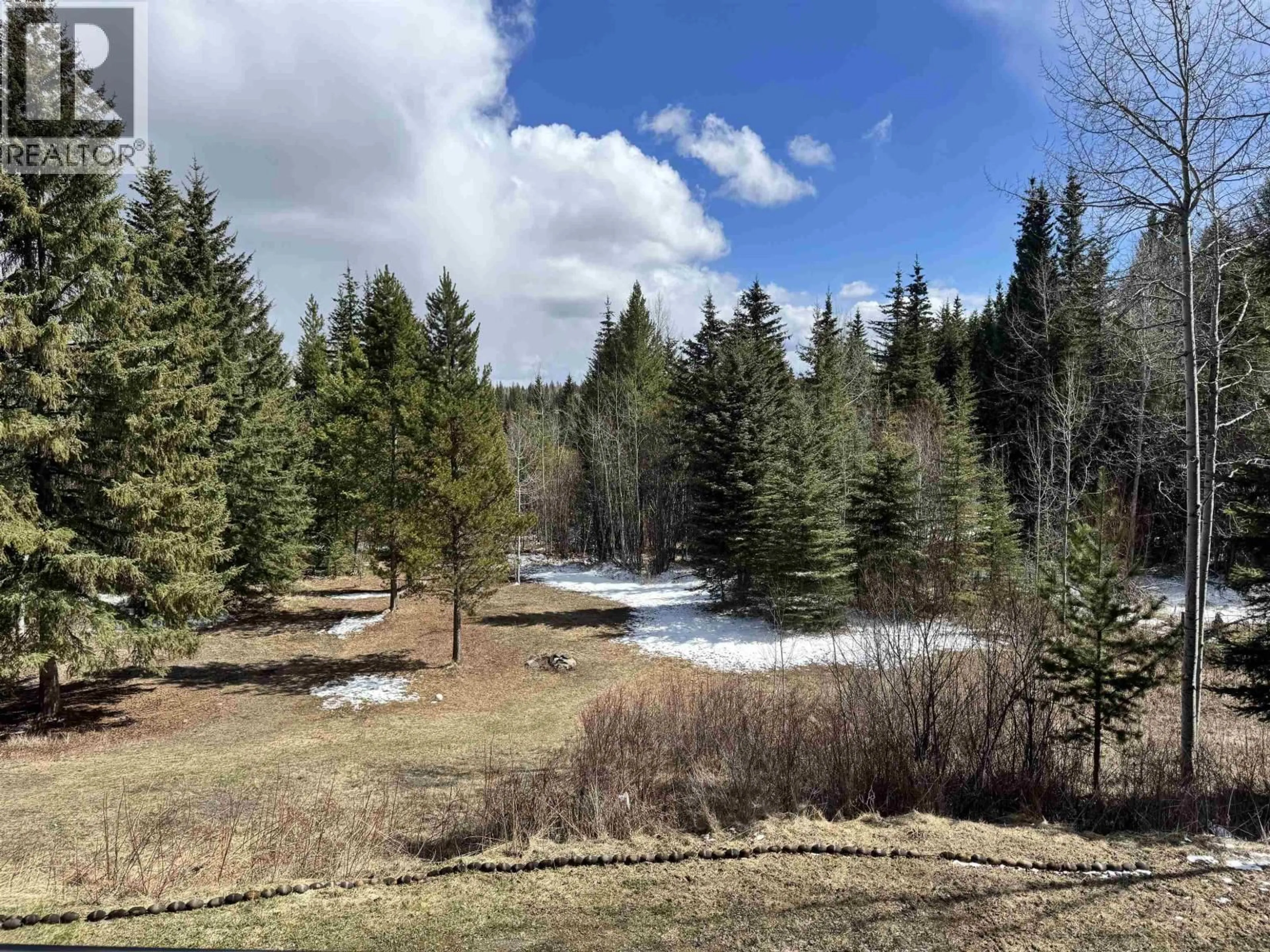 A pic from outside/outdoor area/front of a property/back of a property/a pic from drone, forest/trees view for 6995 COLGAN ROAD, 100 Mile House British Columbia V0K1X1