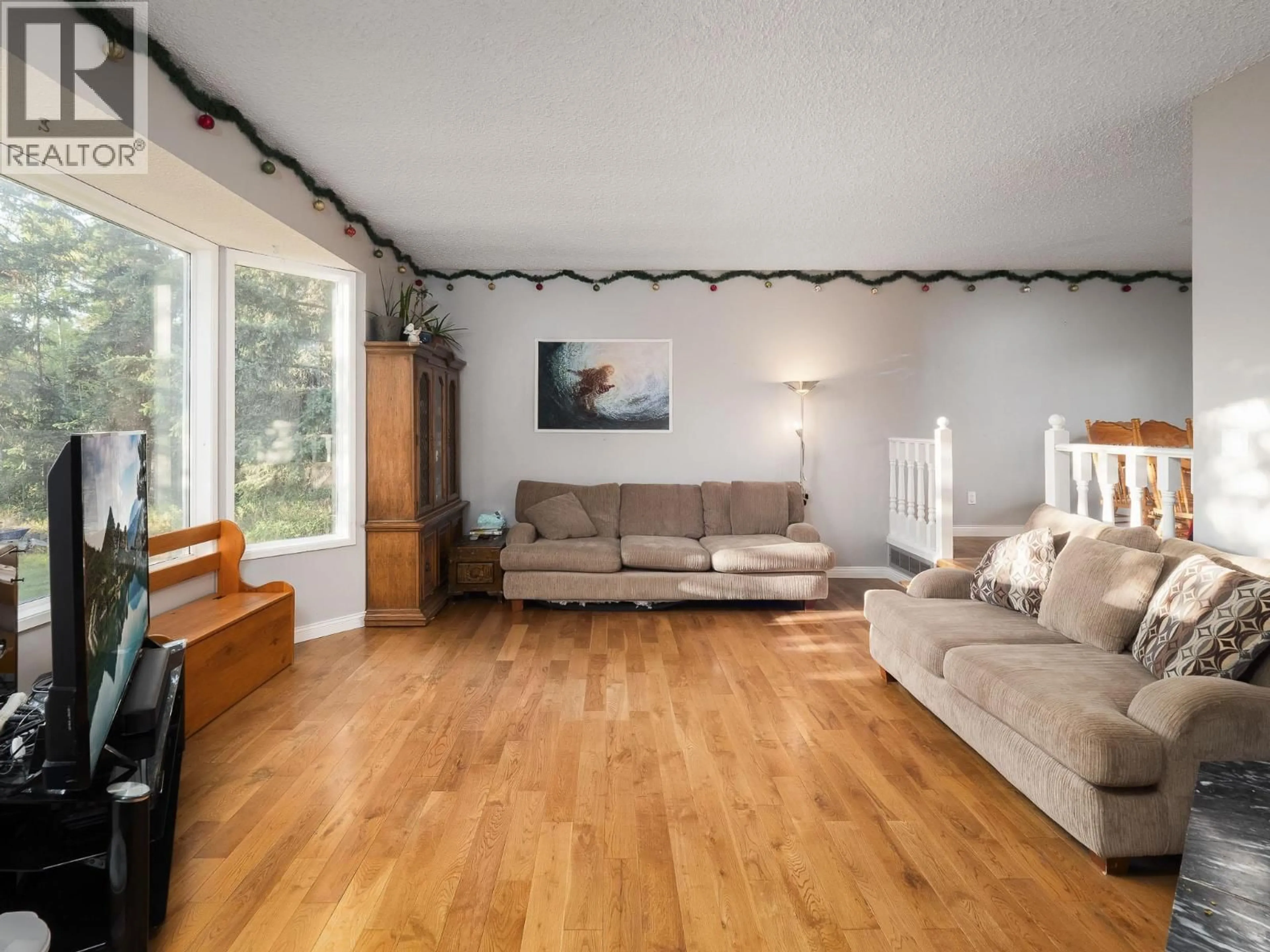 Living room with furniture, wood/laminate floor for 9930 SKYLARK ROAD, Prince George British Columbia V2N5B6