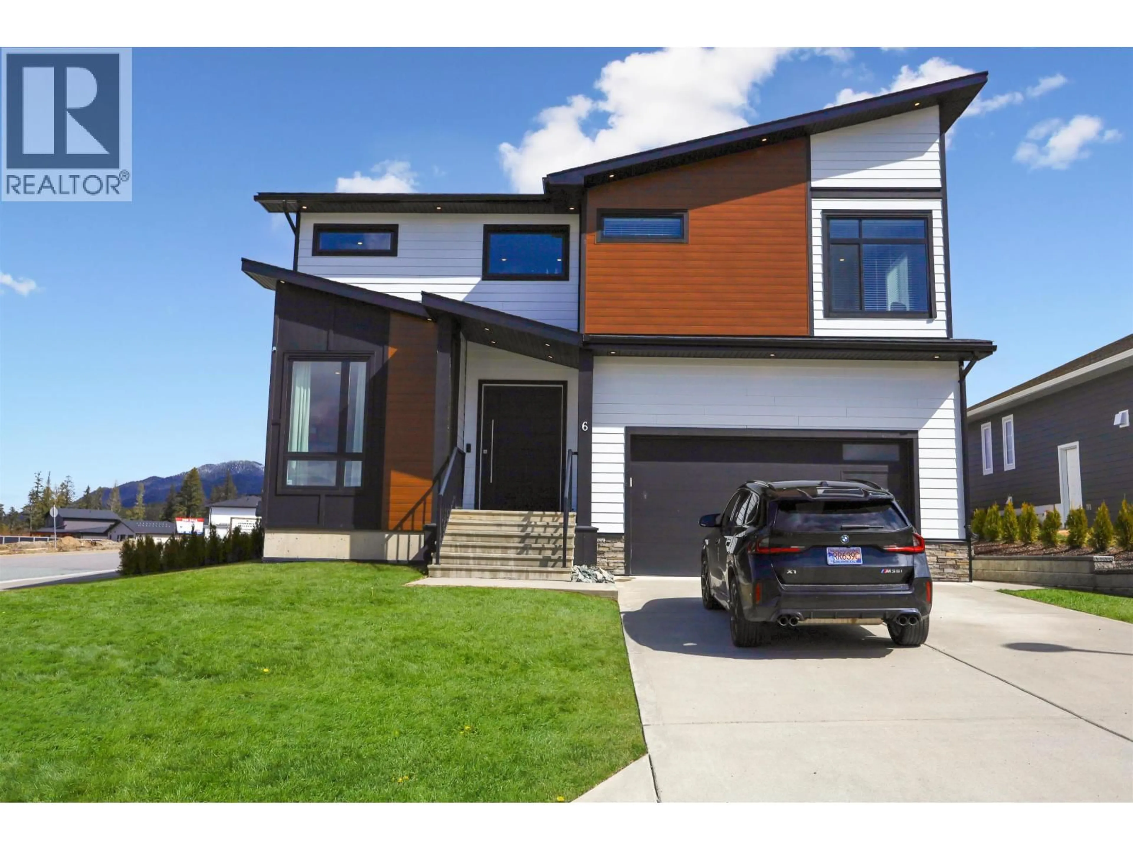 Home with vinyl exterior material, street for 6 ROBINSON STREET, Kitimat British Columbia V8C2S2