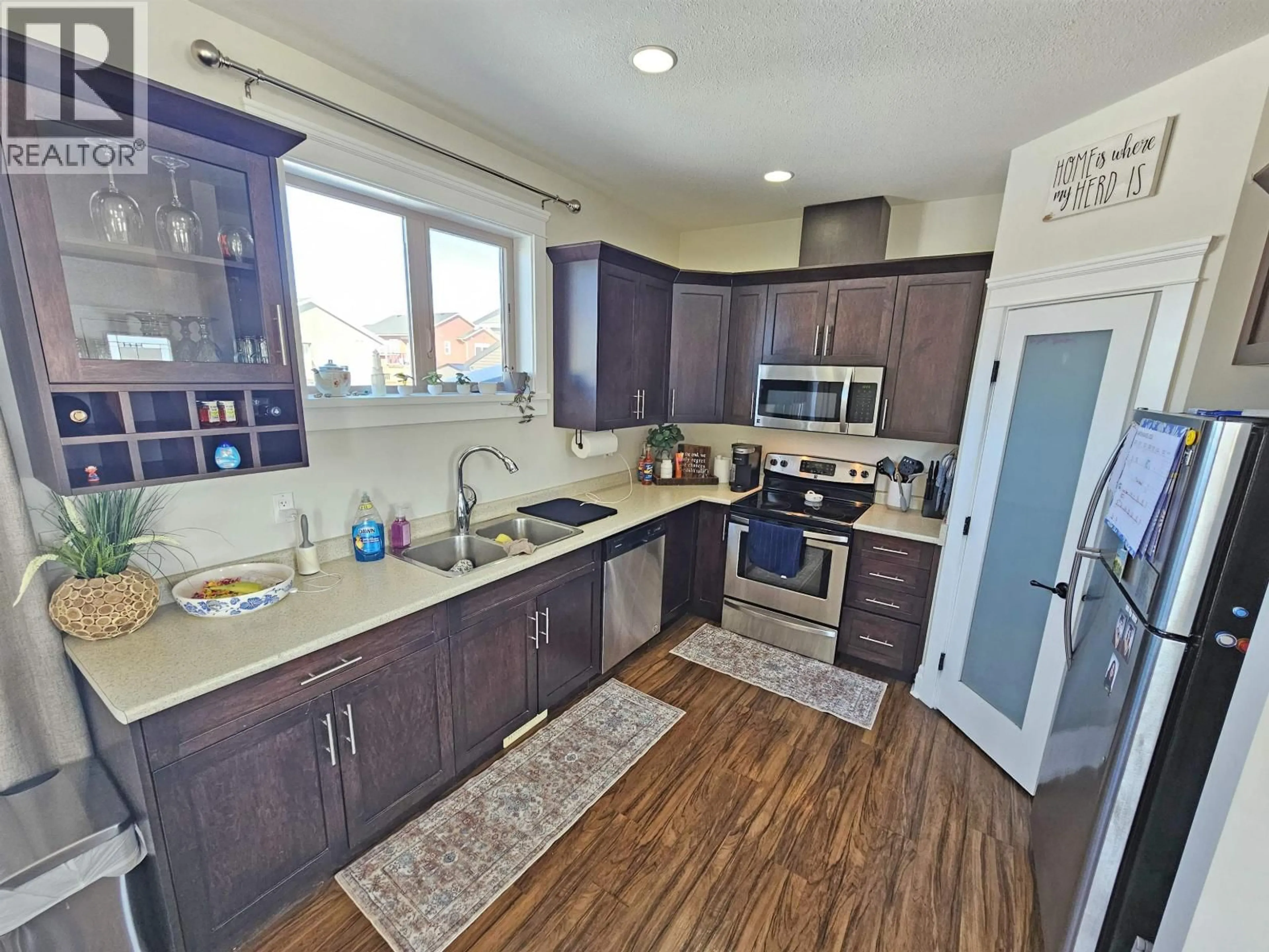 Open concept kitchen, unknown for 8616 84 STREET, Fort St. John British Columbia V1J0K8