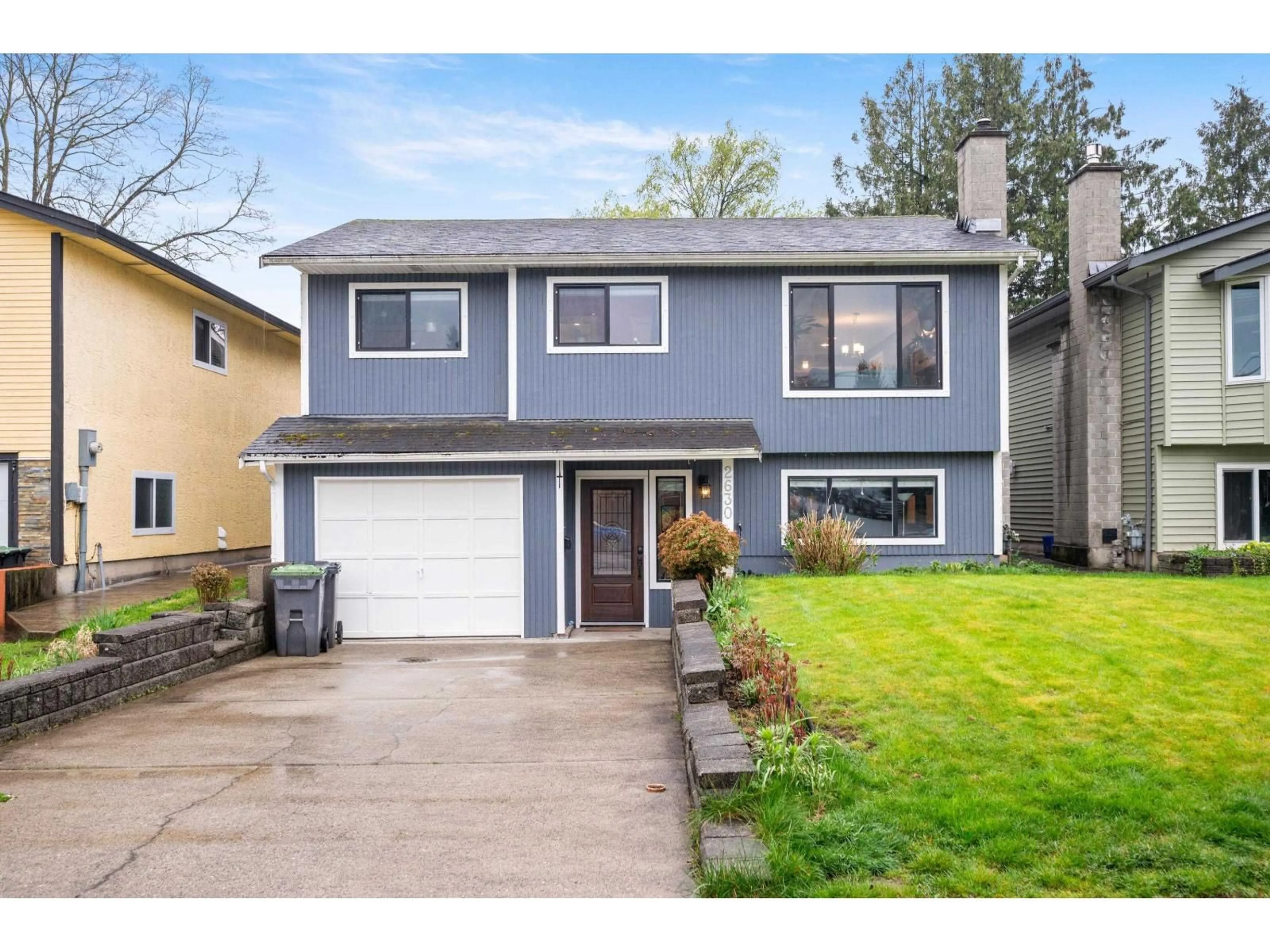 Home with vinyl exterior material, street for 2630 WILDWOOD DRIVE, Langley British Columbia V2Y1C5