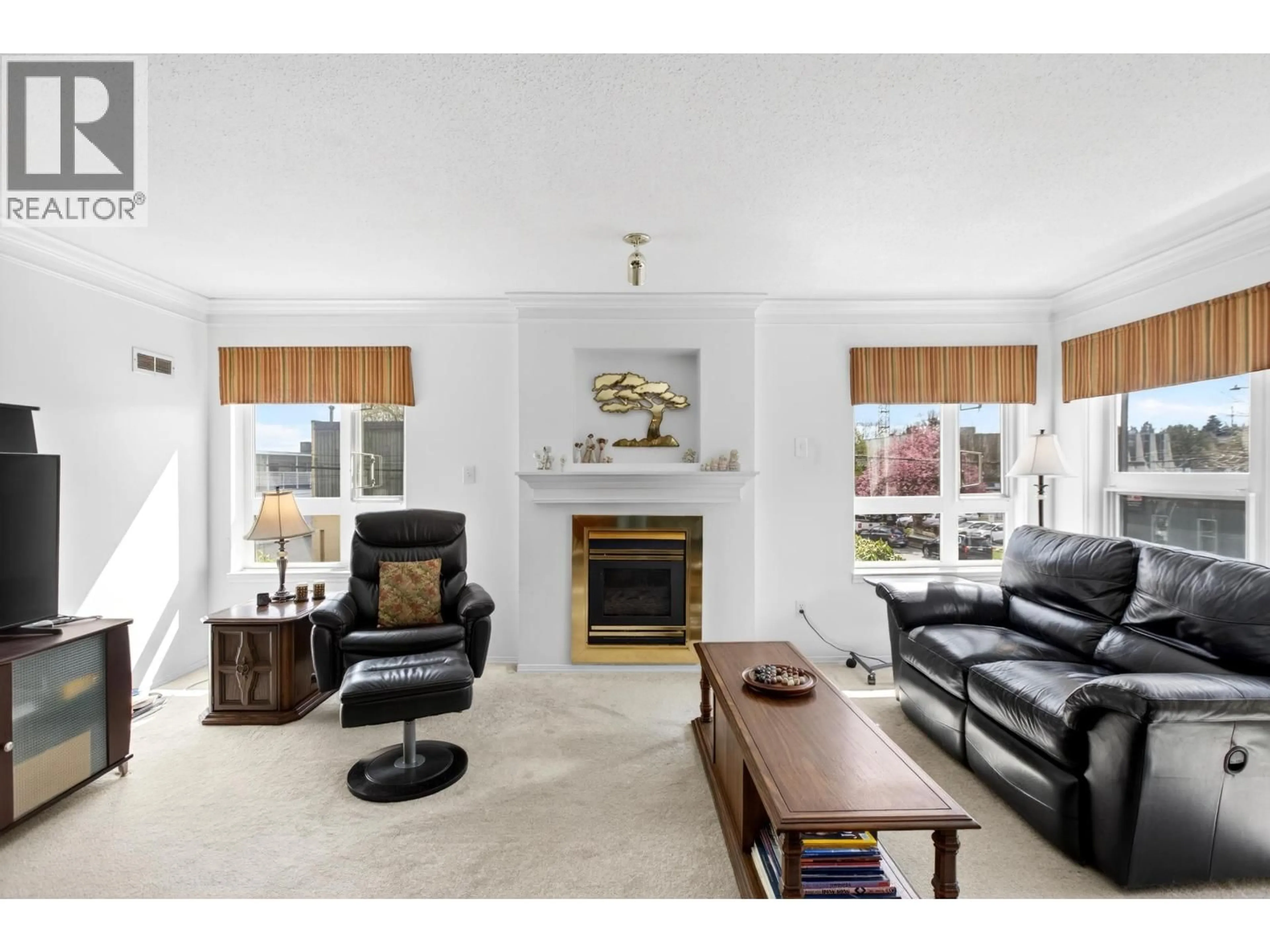 Living room with furniture, unknown for 208 - 2335 WHYTE AVENUE, Port Coquitlam British Columbia V3C2A3