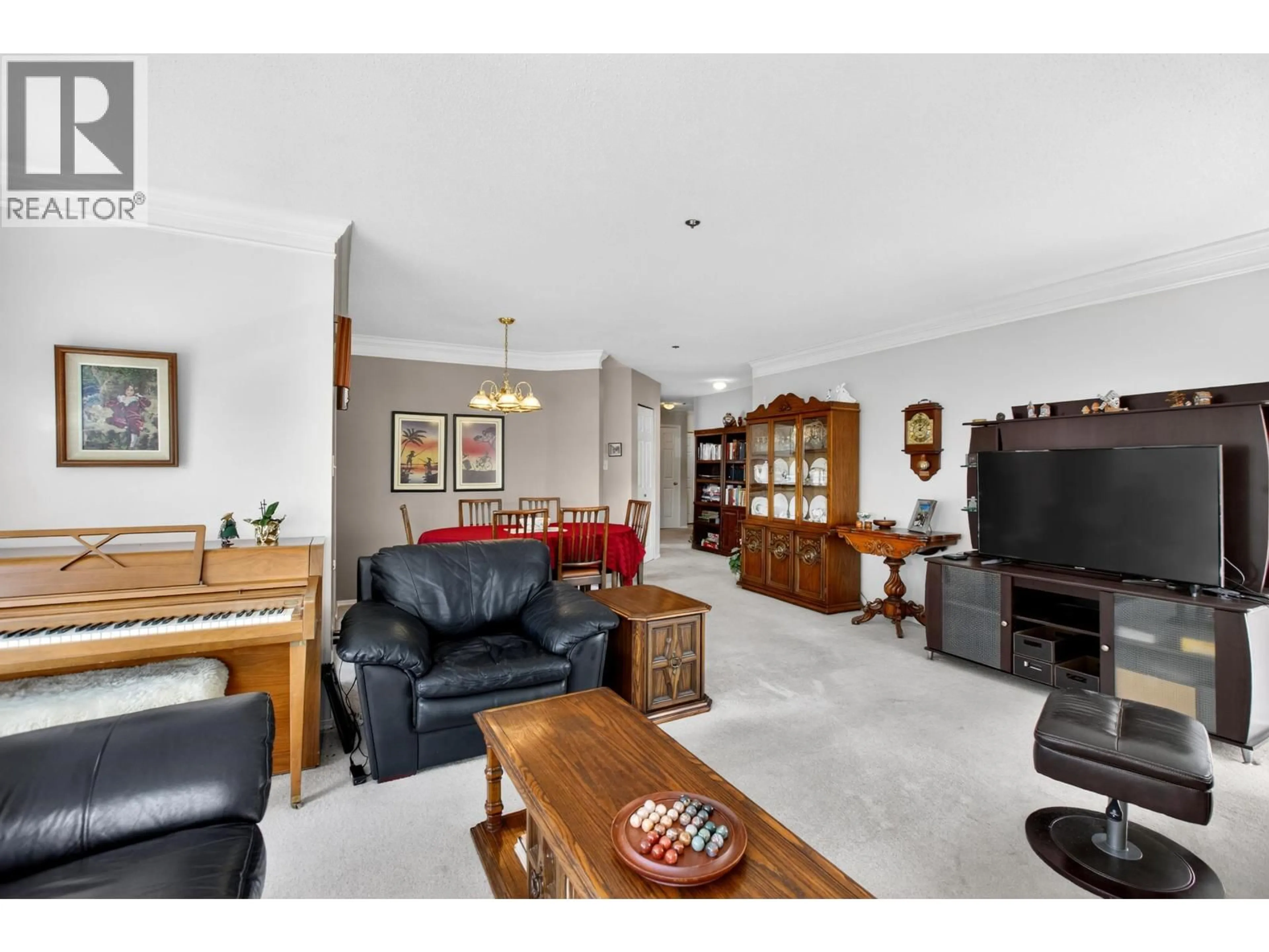 Living room with furniture, unknown for 208 - 2335 WHYTE AVENUE, Port Coquitlam British Columbia V3C2A3