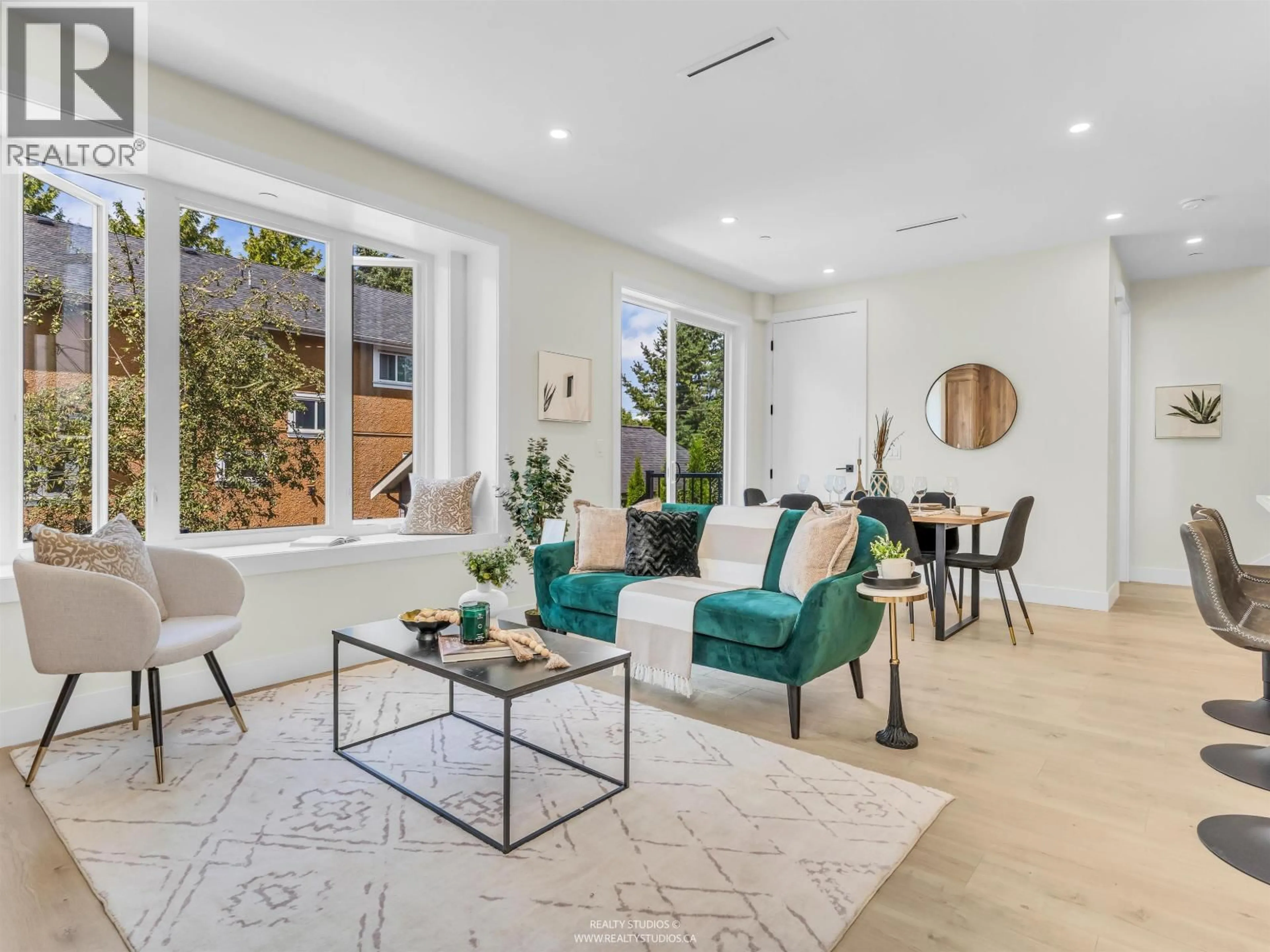 Living room with furniture, ceramic/tile floor for 2 - 5221 CLARENDON STREET, Vancouver British Columbia V5R3J7