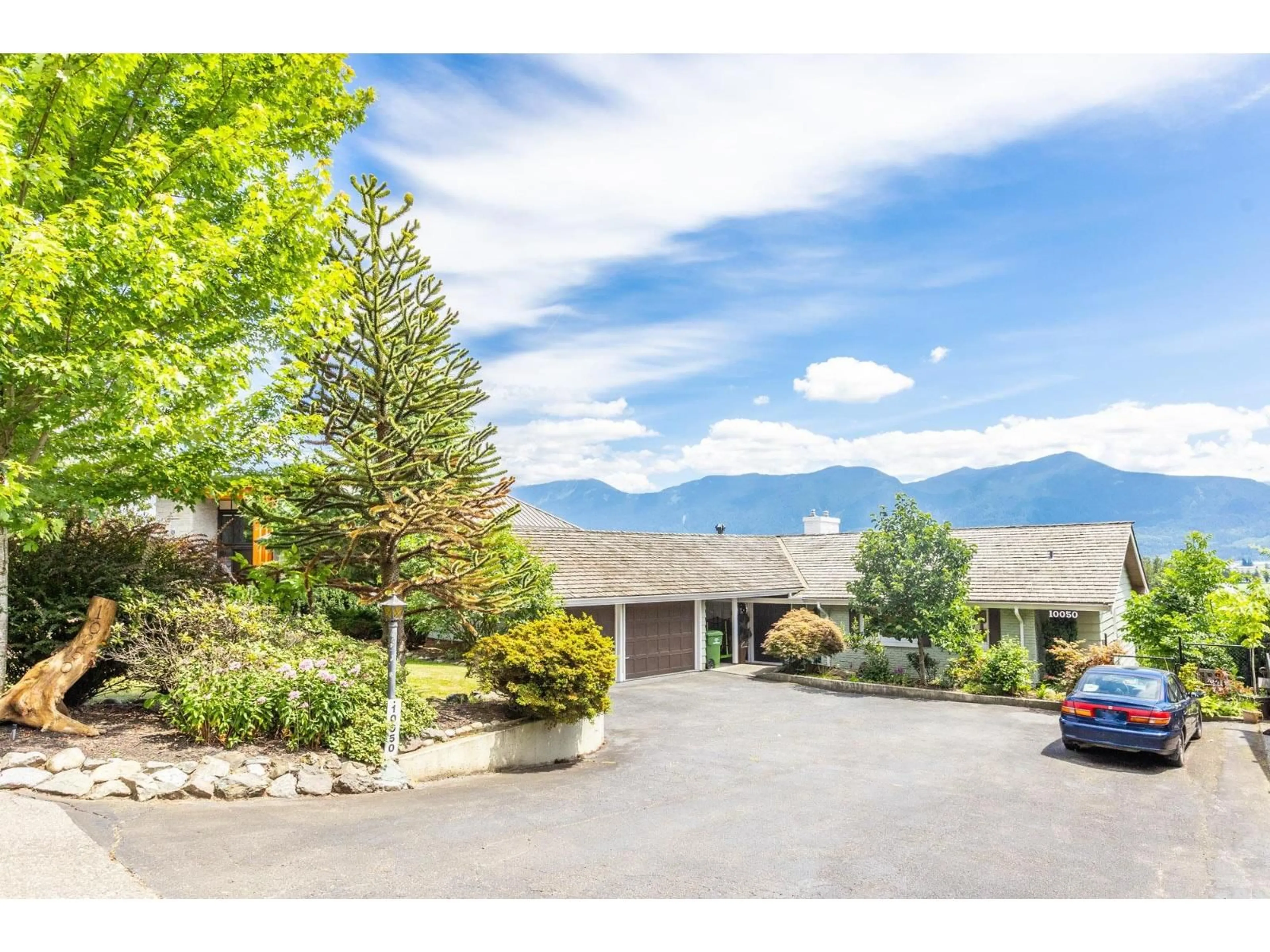 A pic from outside/outdoor area/front of a property/back of a property/a pic from drone, mountain view for 10050 TIMBERLINE PLACE, Chilliwack British Columbia V2P7N9