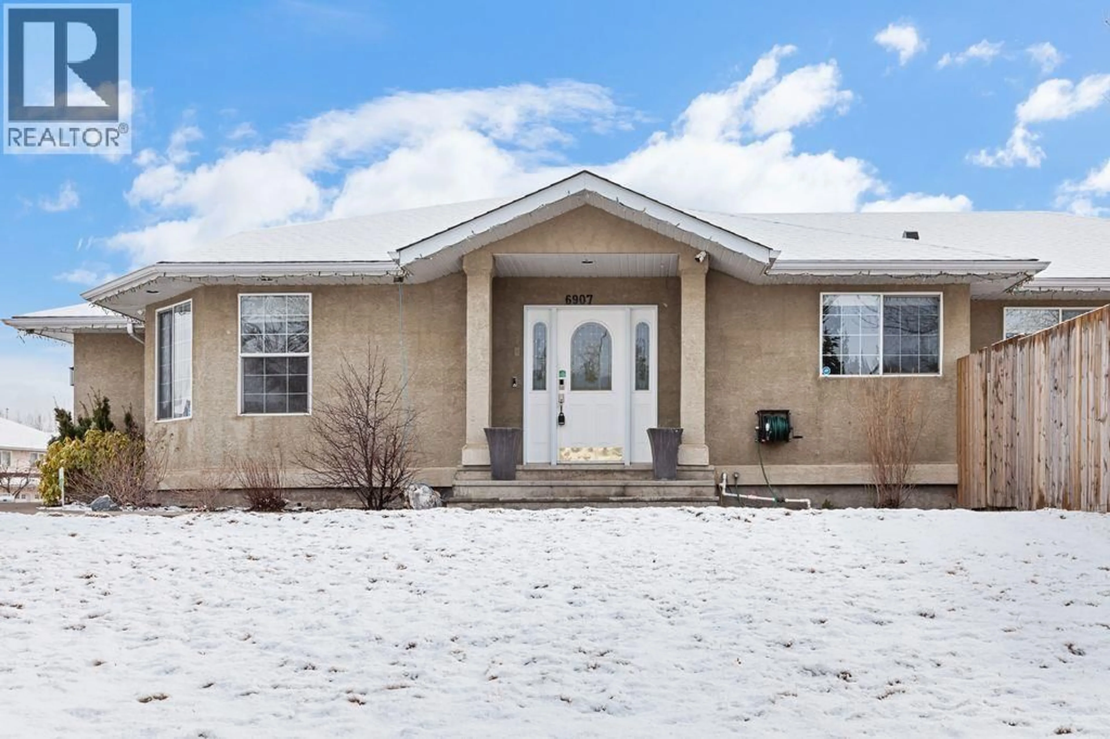 Home with vinyl exterior material, street for 6907 ST ANTHONY CRESCENT, Prince George British Columbia V2N5A2