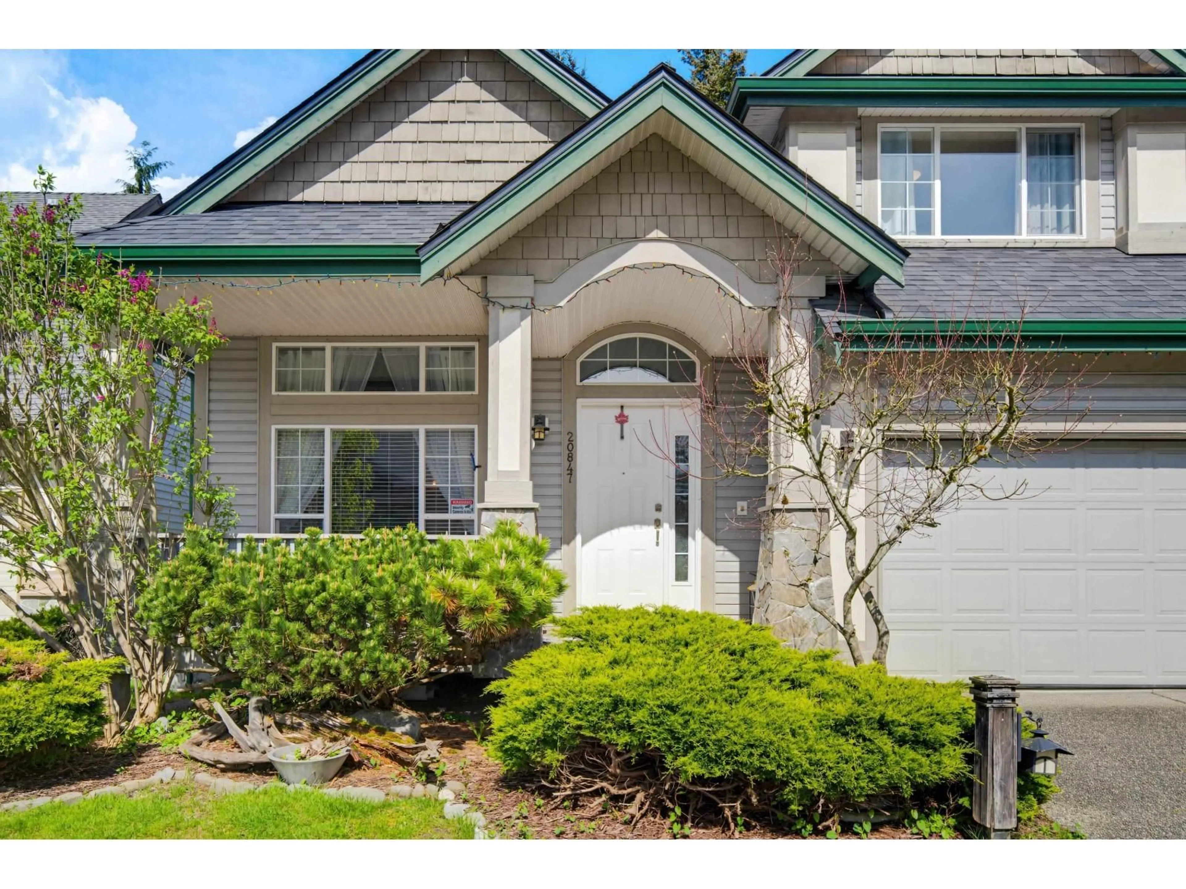 Home with vinyl exterior material, street for 20847 97B AVENUE, Langley British Columbia V1M3Z2